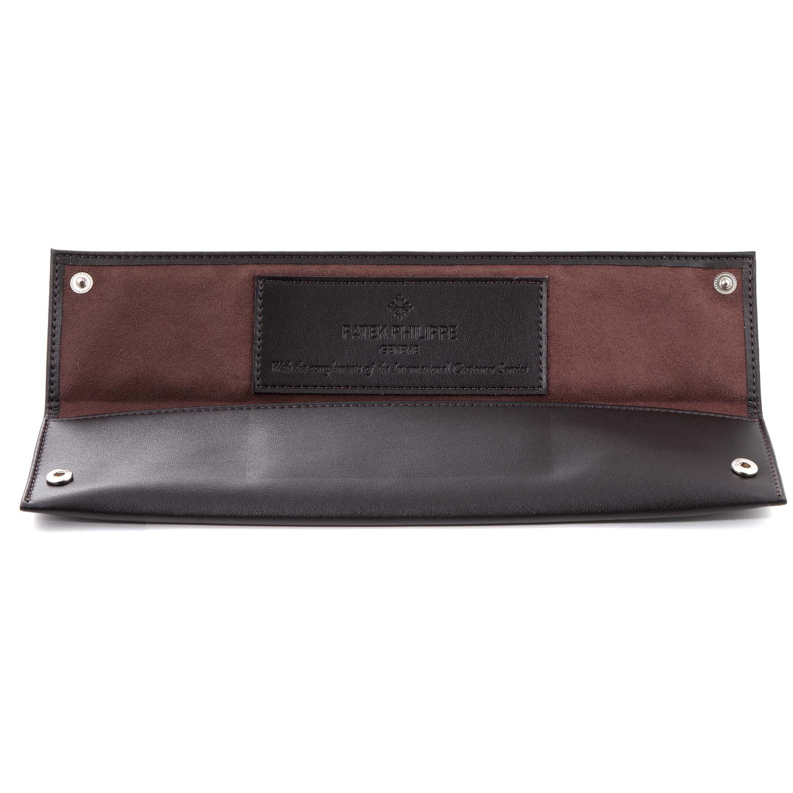 The image shows an open Patek Philippe Calatrava 5119R Men's Rose Gold White Dial 5119R Men's Rose Gold White Dial watch leather case with press studs and inner branding.