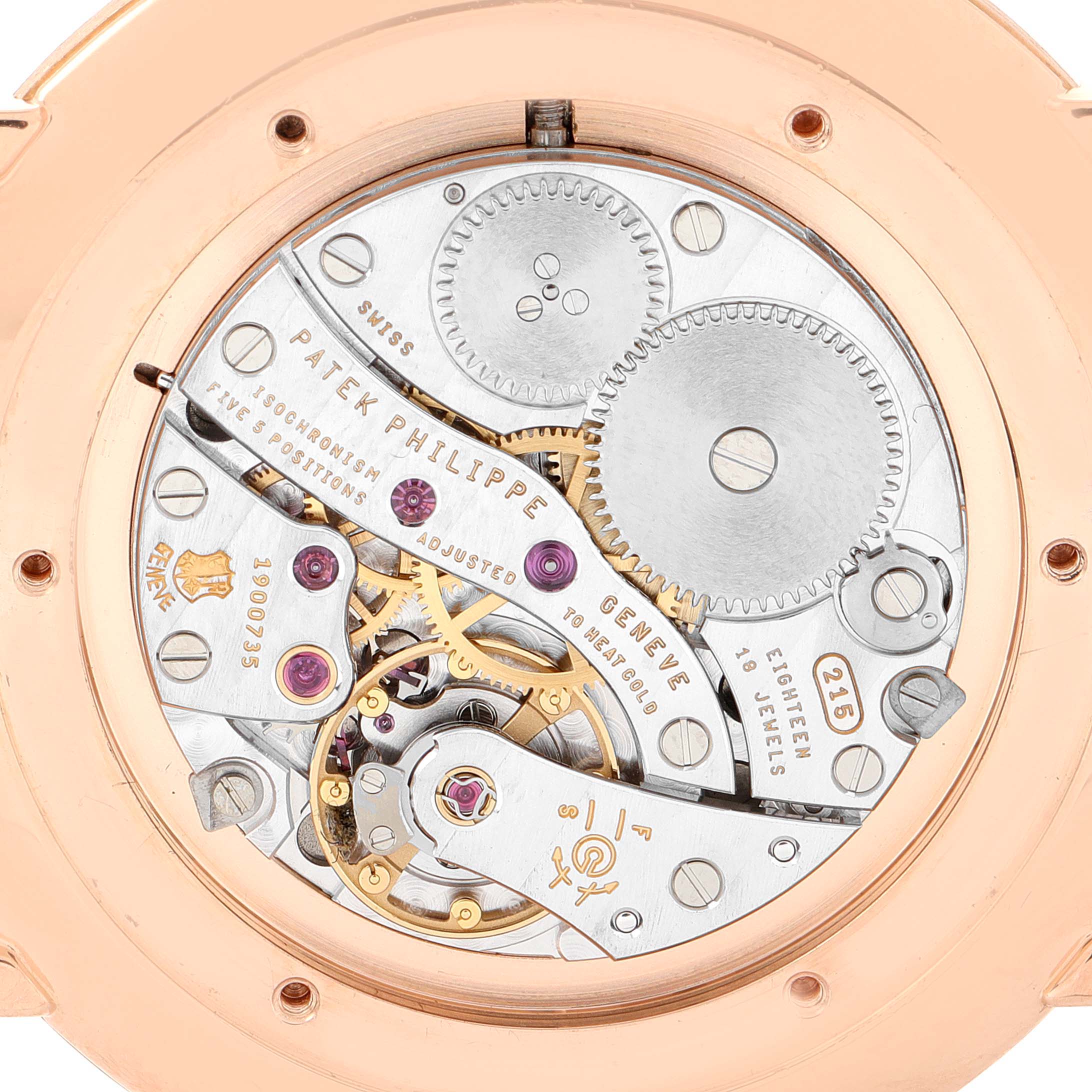 This close-up shot displays the intricate movement and inner workings of a Patek Philippe Calatrava 5119R Men's Rose Gold White Dial 5119R Men's Rose Gold White Dial model watch.