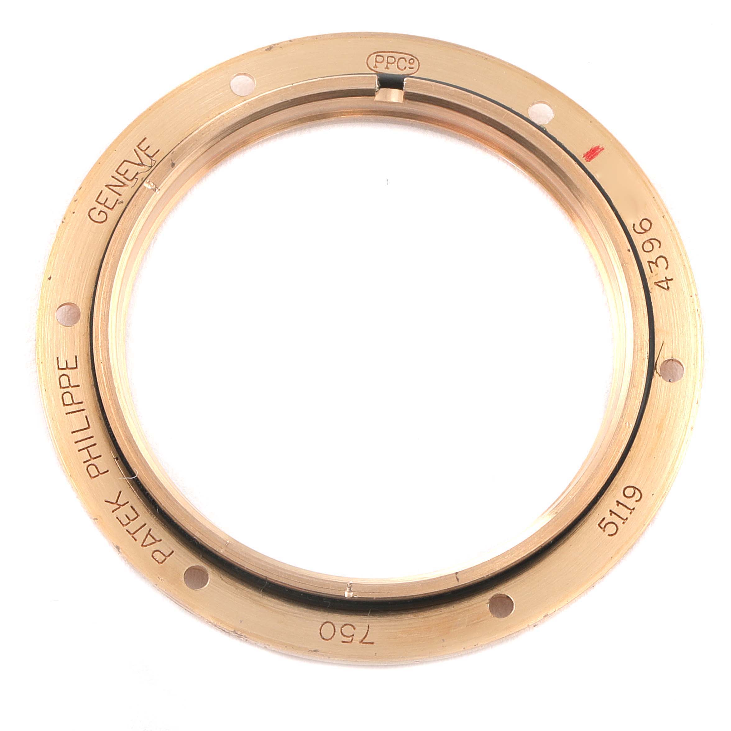 This image shows a bezel from a Patek Philippe Calatrava 5119R Men's Rose Gold White Dial 5119R Men's Rose Gold White Dial model, viewed from a top-down angle.