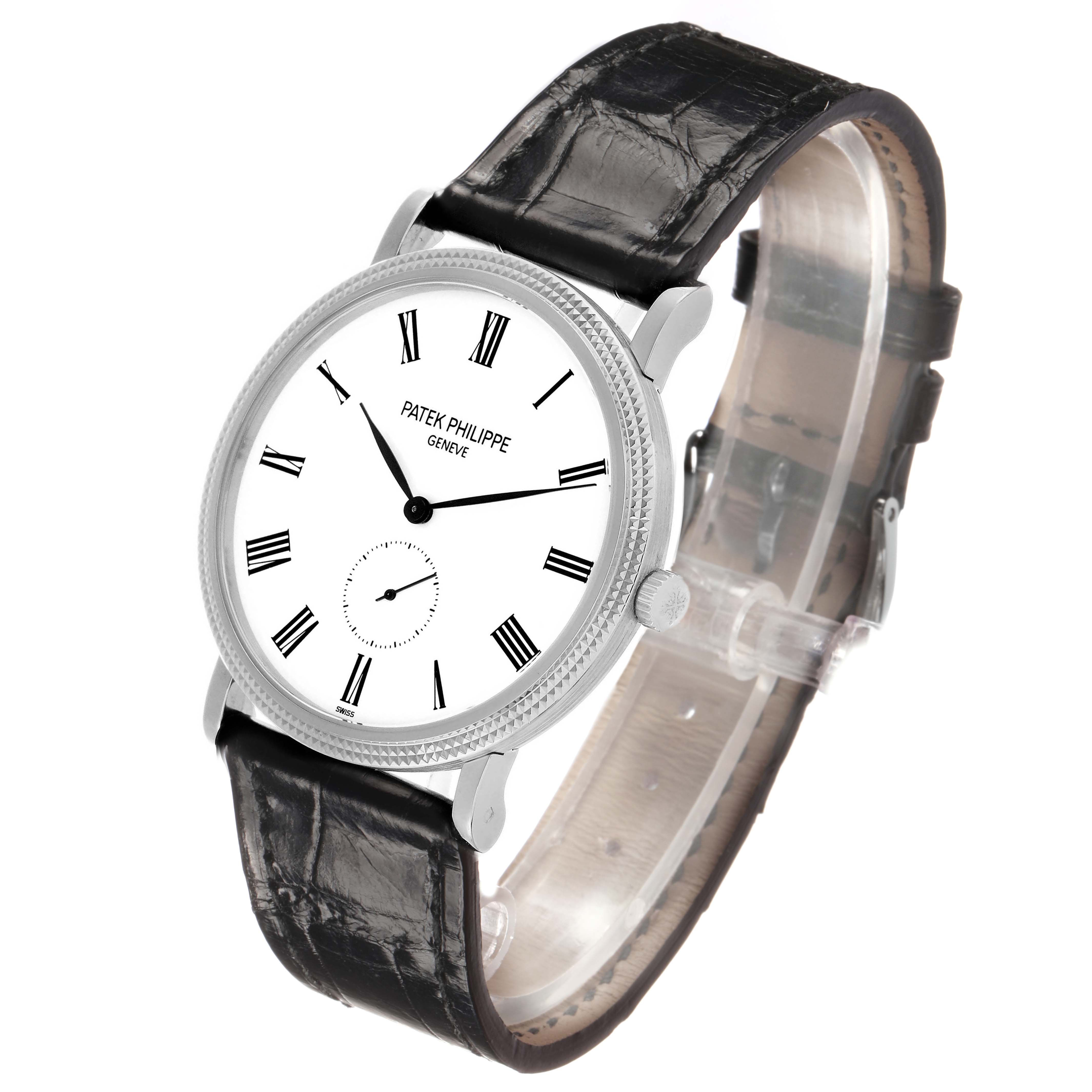 The Patek Philippe Calatrava 5119G Men's White Gold White Dial watch is shown at a slight angle highlighting the face, bezel, crown, and leather strap.