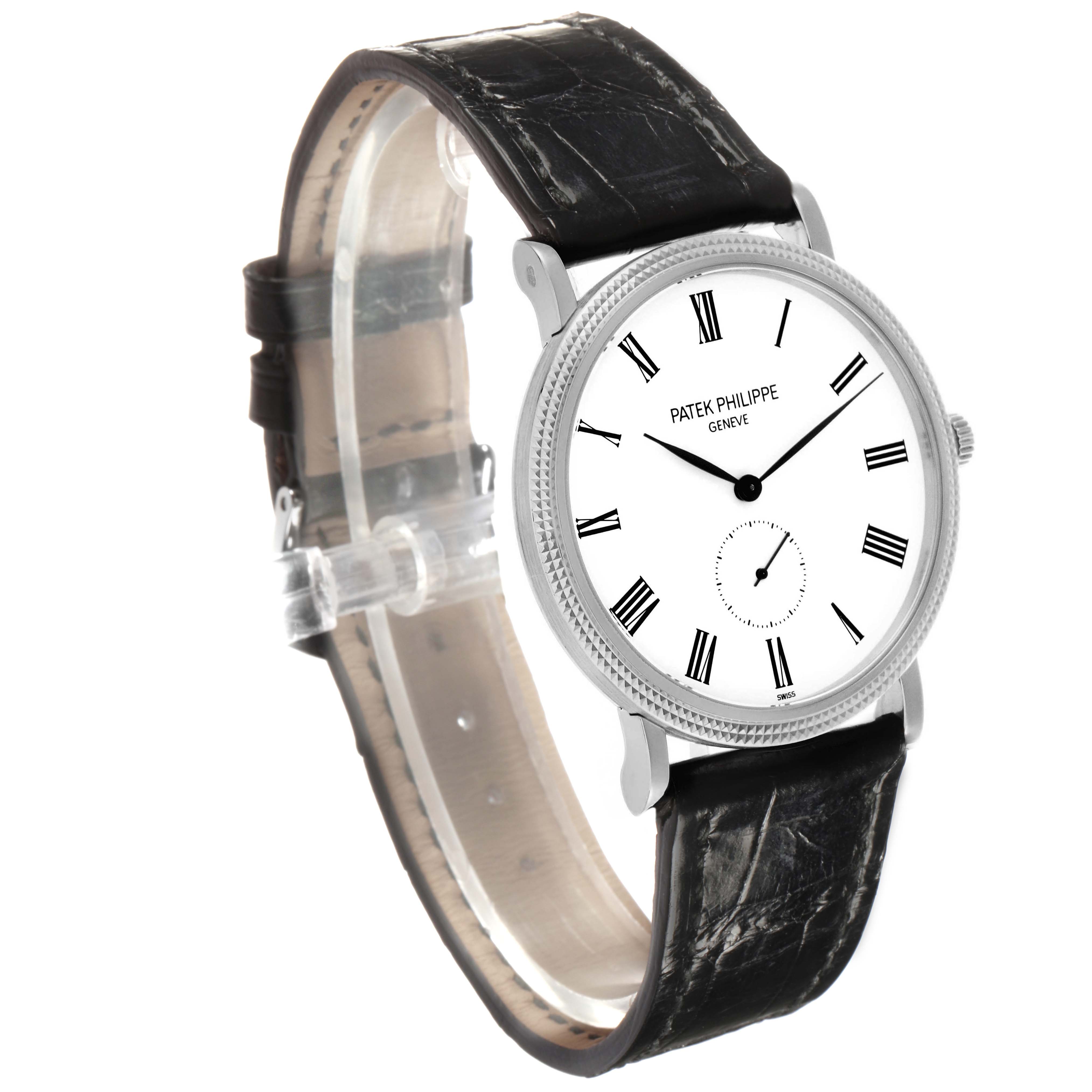 The Patek Philippe Calatrava 5119G Men's White Gold White Dial watch is shown at a slight side angle, highlighting the dial, bezel, and leather strap.