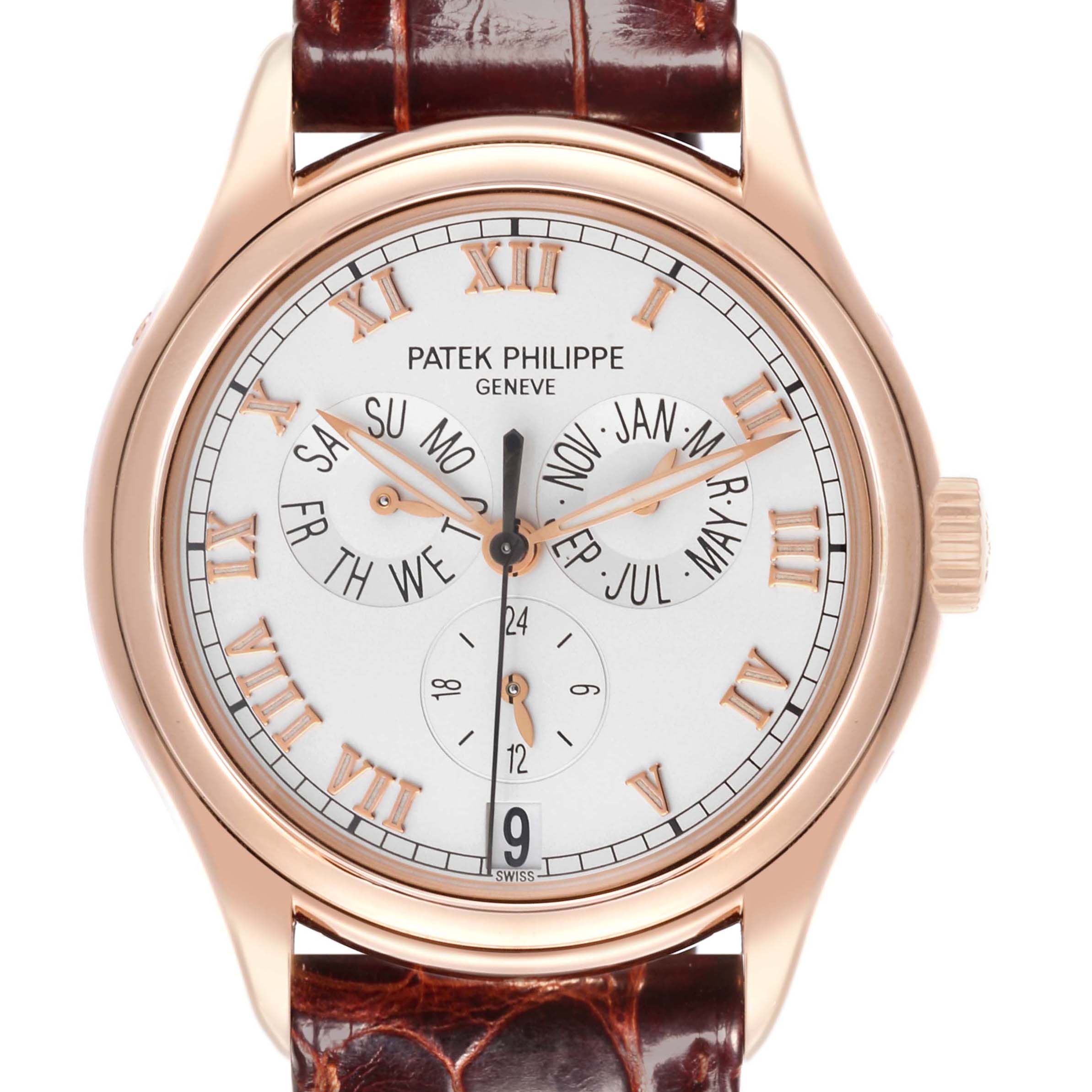 The Patek Philippe Complications 5035R-001 Men
s Rose Gold Silver Dial 5035R-001 Men
s Rose Gold Silver Dial watch is shown from the front, displaying Roman numerals, subdials, and a date aperture.