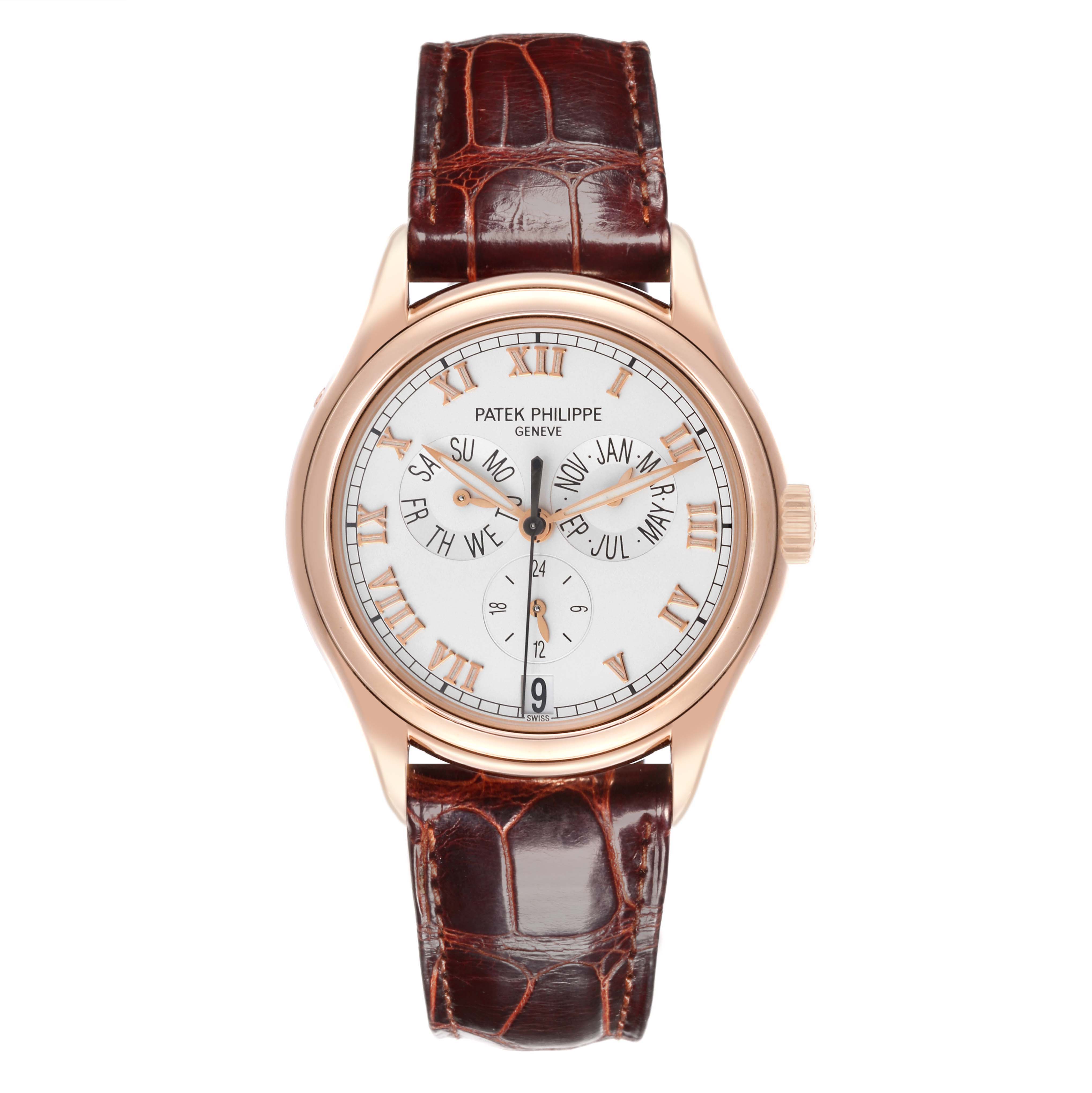 The Patek Philippe Complications 5035R-001 Men
s Rose Gold Silver Dial 5035R-001 Men
s Rose Gold Silver Dial watch is shown from a front angle, displaying the dial and brown leather strap.