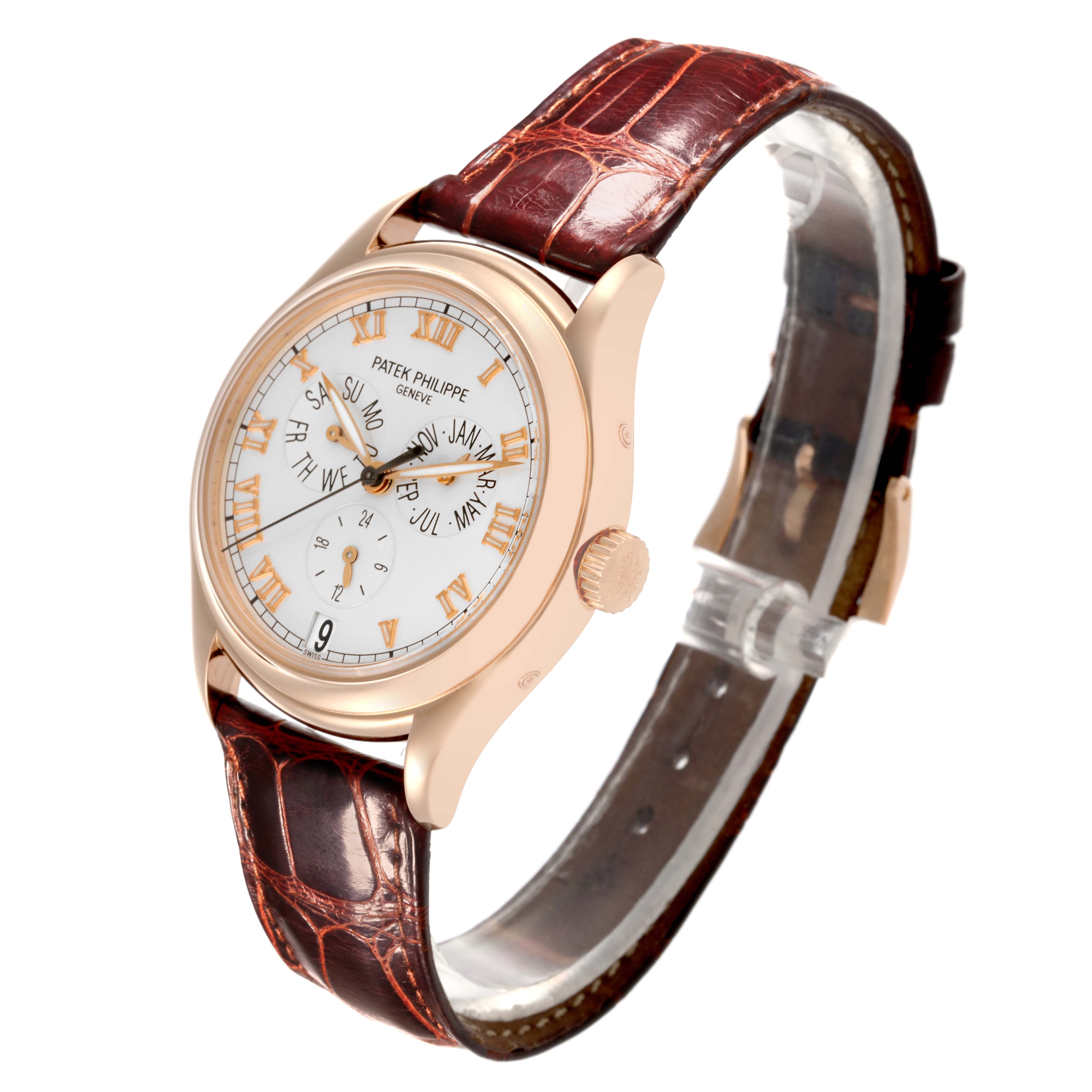 The Patek Philippe Complications 5035R-001 Men
s Rose Gold Silver Dial 5035R-001 Men
s Rose Gold Silver Dial watch is shown at a three-quarter angle, displaying the dial, bezel, crown, and leather strap.