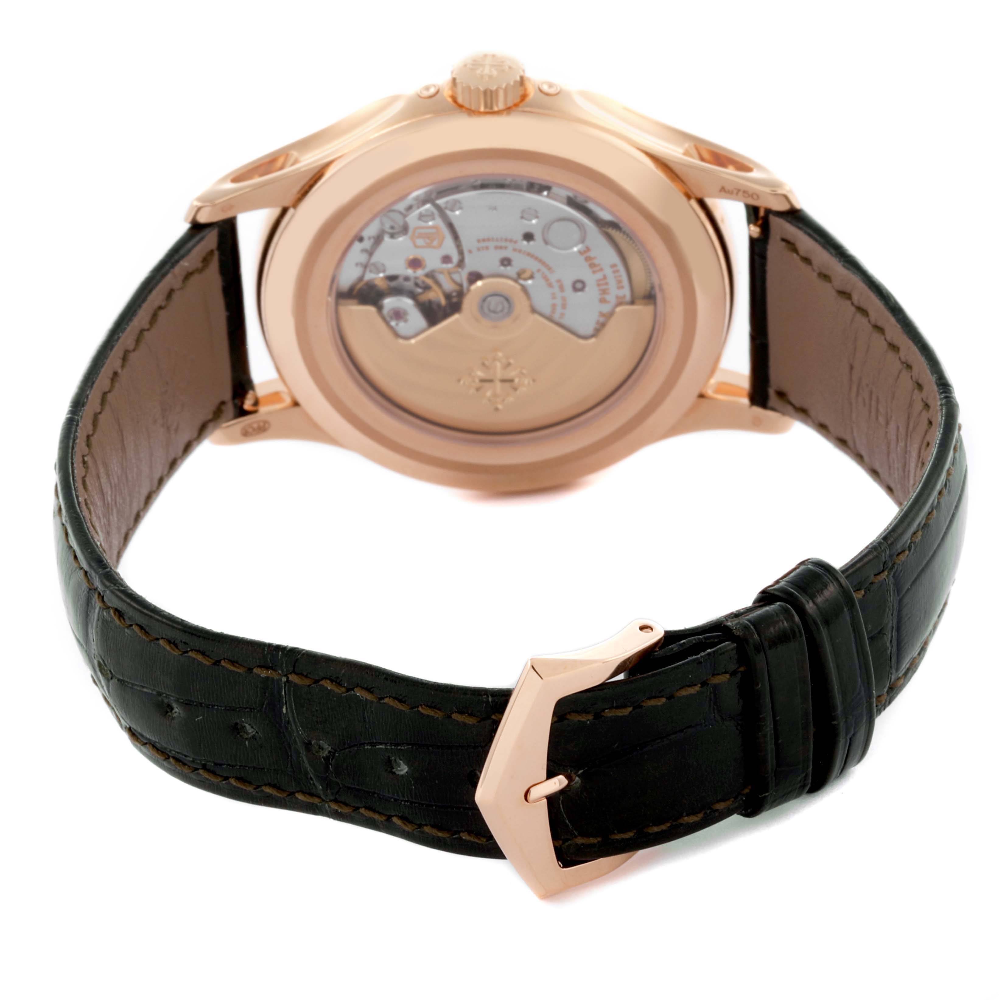 The image shows the back view of the Patek Philippe Complications 5205R - 011 Men's Rose Gold Green Dial 5205R - 011 Men's Rose Gold Green Dial watch, highlighting its movement and leather strap.