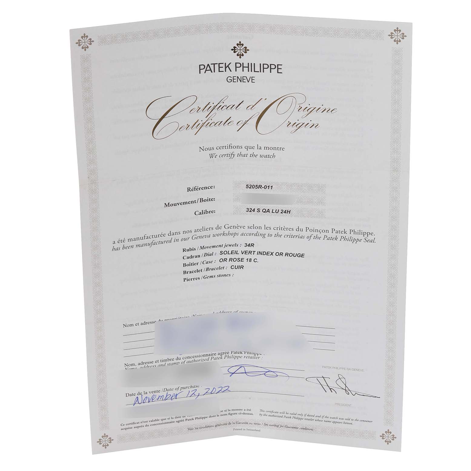The image shows a Certificate of Origin for a Patek Philippe Complications 5205R - 011 Men's Rose Gold Green Dial 5205R - 011 Men's Rose Gold Green Dial watch, model reference 5205R-011.