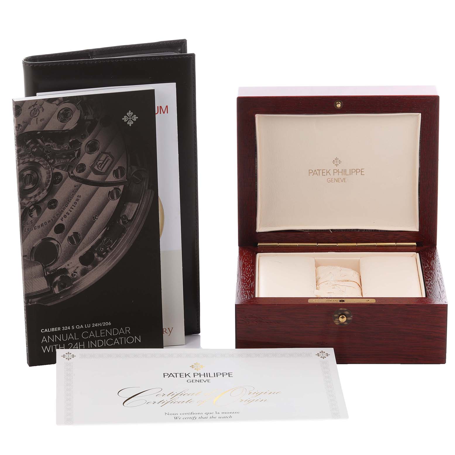 The image shows the packaging for a Patek Philippe Complications 5205R - 011 Men's Rose Gold Green Dial 5205R - 011 Men's Rose Gold Green Dial watch, including a wooden box, manuals, and a certificate.