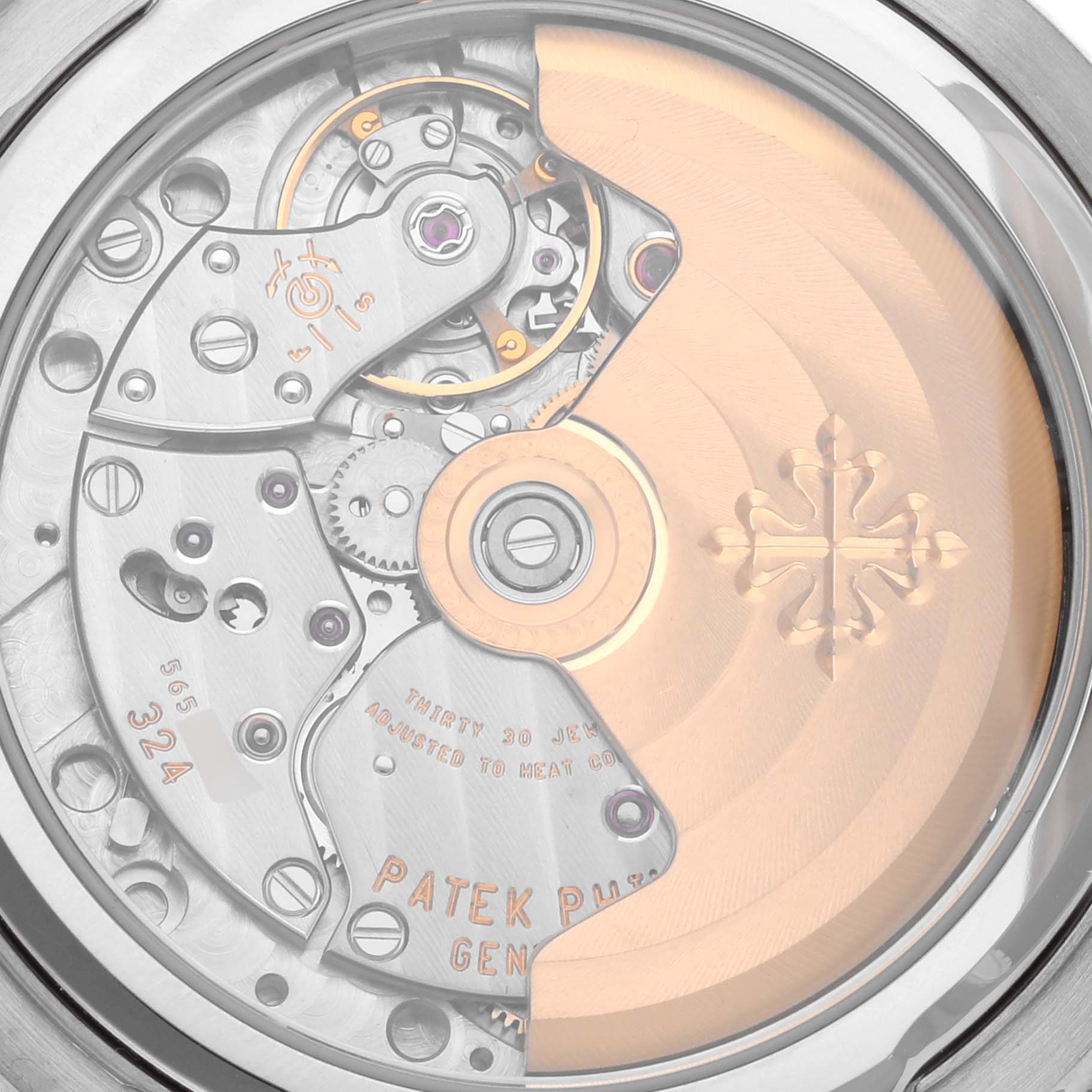 The image shows the back view of the Patek Philippe Complications 5159G-001 Men's White Gold White Dial 5159G-001 Men's White Gold White Dial model, highlighting its intricate movement and rotor.