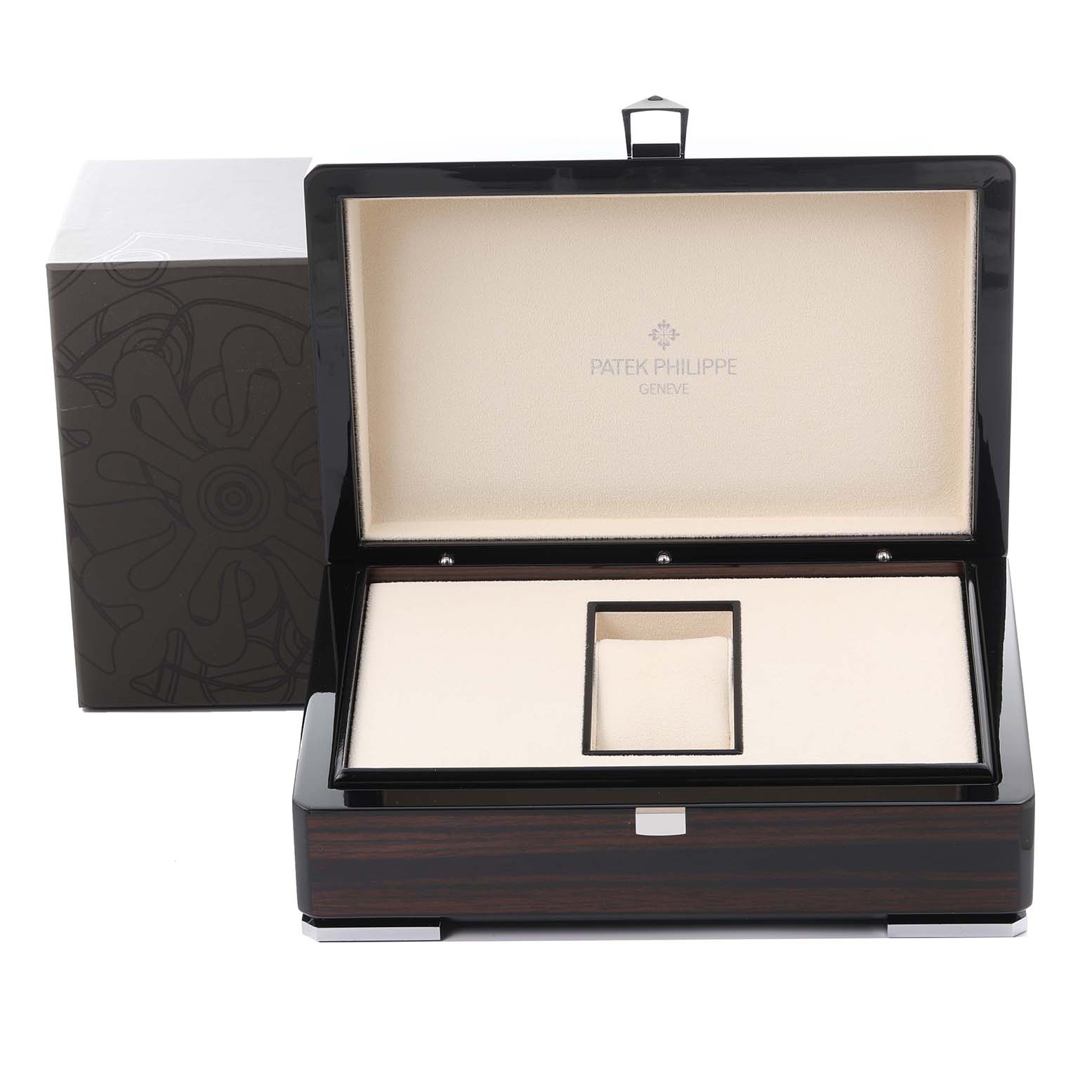 This image shows an open presentation box for the Patek Philippe Complications 5159G-001 Men's White Gold White Dial 5159G-001 Men's White Gold White Dial model, with a cushioned interior.