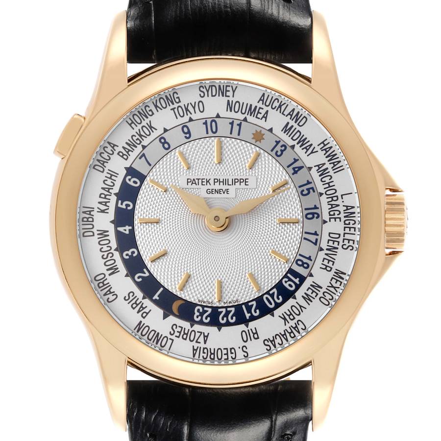 The Patek Philippe Complications watch is shown from the front, highlighting the dial with world time cities and time indicators.