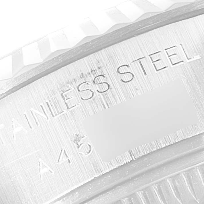 The image shows a close-up of the side of a Rolex Datejust 79174 Women
s Stainless Steel Silver Dial 79174 Women
s Stainless Steel Silver Dial watch case, highlighting the engraved text "STAINLESS STEEL."
