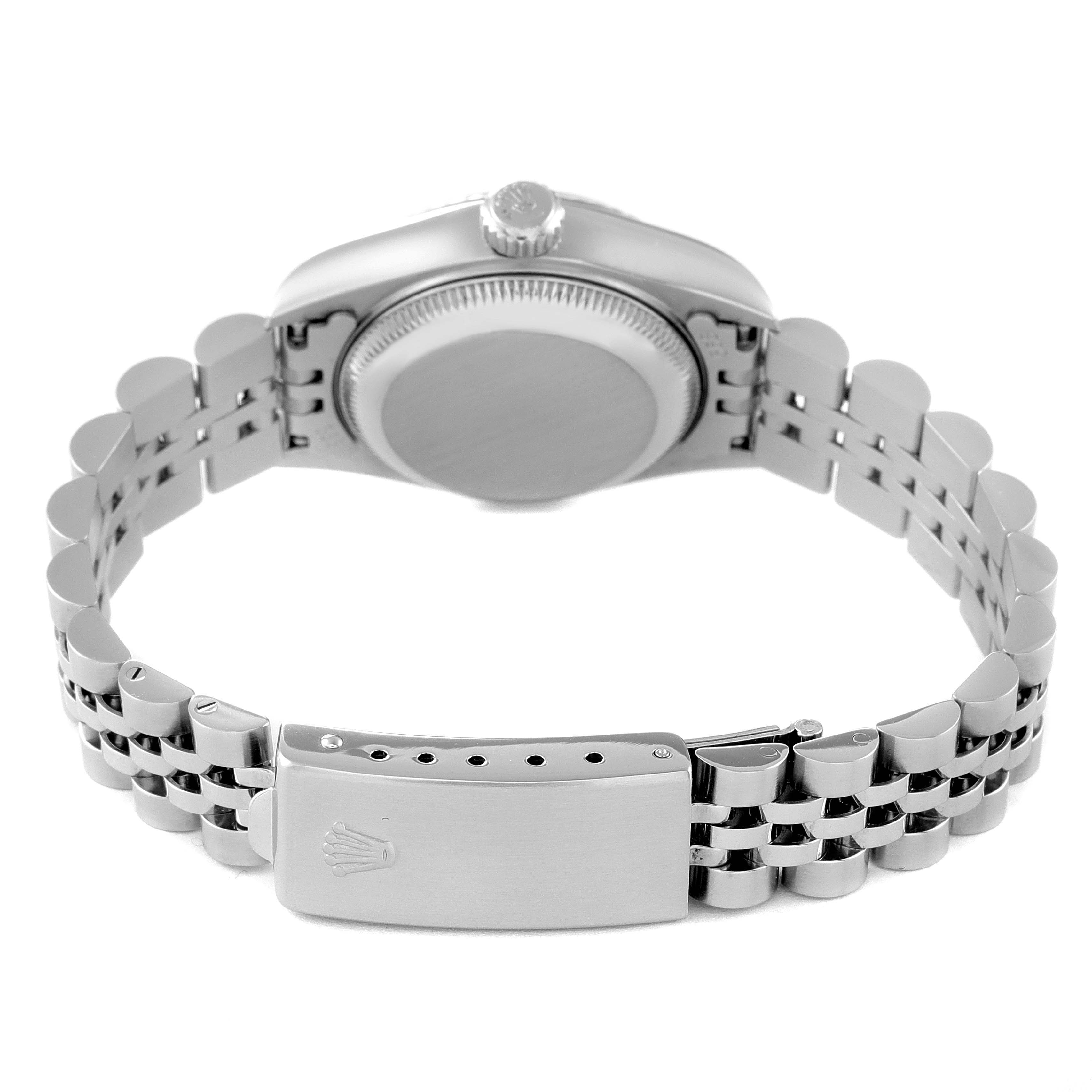 This is a rear view of a Rolex Datejust 79174 Women
s Stainless Steel Silver Dial 79174 Women
s Stainless Steel Silver Dial watch showing the case back, crown, and Jubilee bracelet.