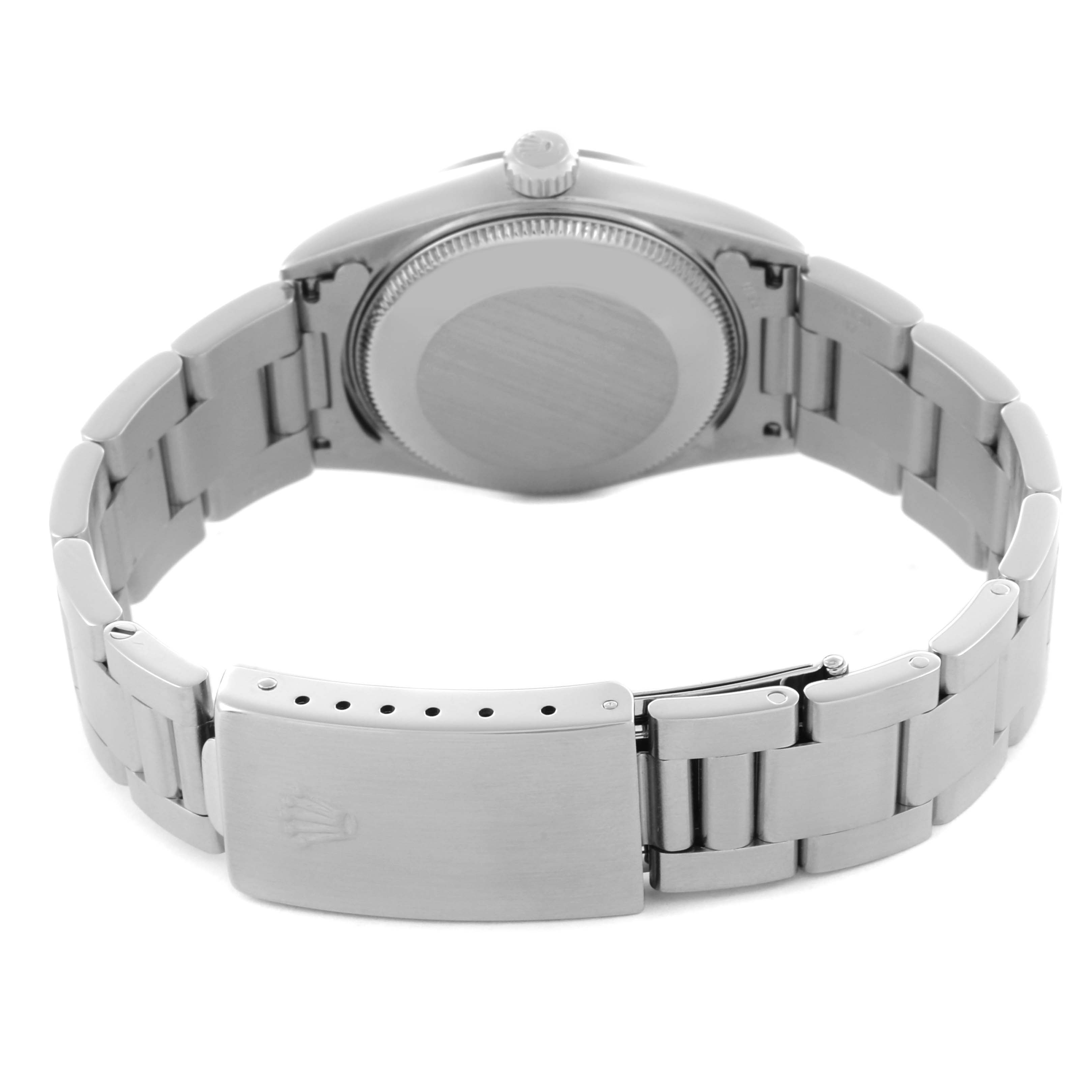 The image shows a Rolex Mid-Size 78240 Women's Stainless Steel Silver Dial 78240 Women's Stainless Steel Silver Dial watch from the back, highlighting the clasp, bracelet, and case back.