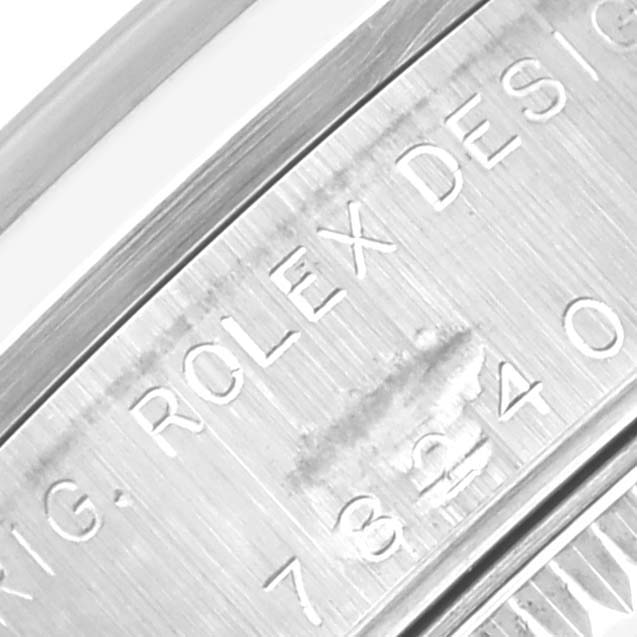 The image shows a close-up of the case engraving on a mid-size Rolex watch, featuring the model number.