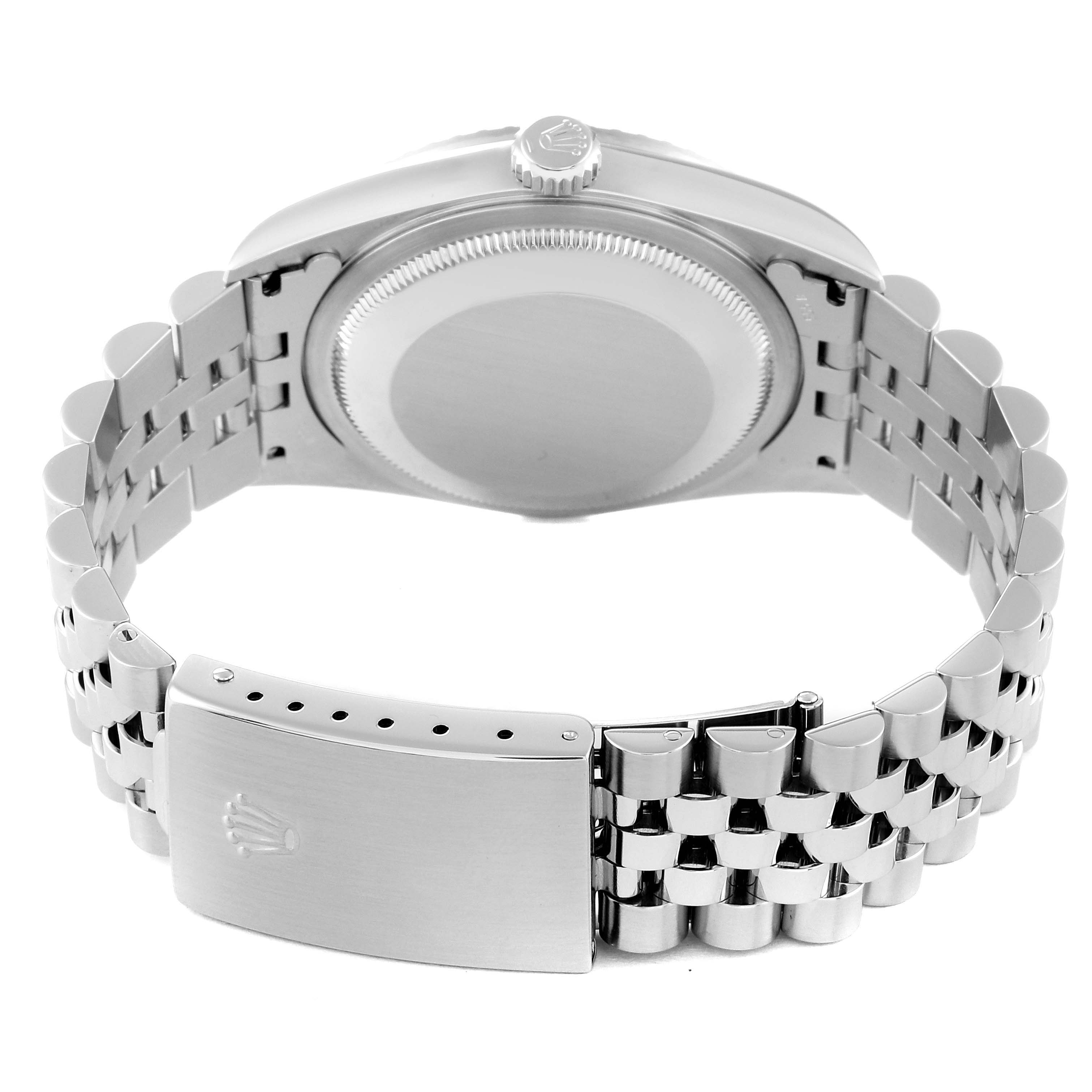 The image shows the Rolex Datejust 16220 Men's Stainless Steel White Dial 16220 Men's Stainless Steel White Dial watch from the rear, highlighting the case back and the bracelet with the clasp.