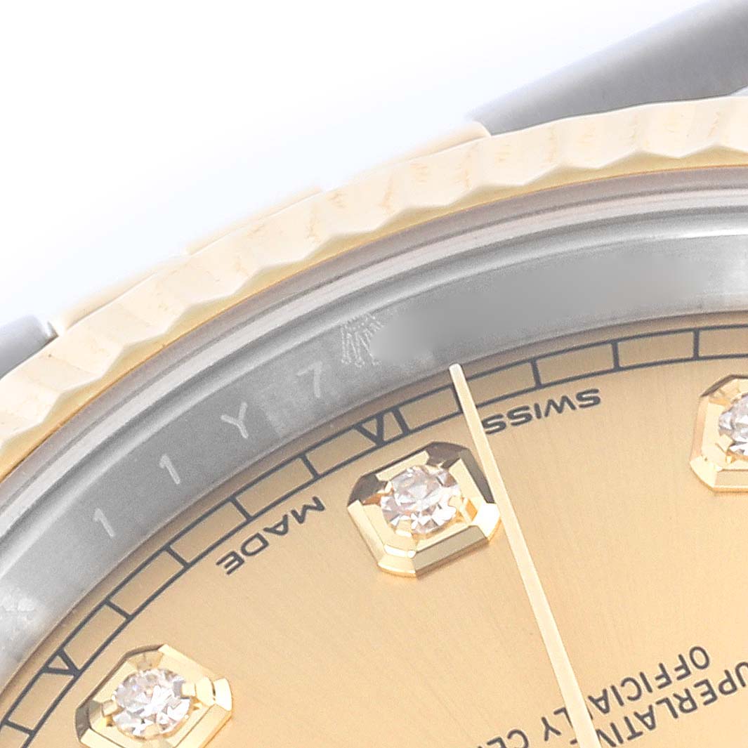 The image shows a close-up of the Rolex Datejust 41 126333 Men's Steel and Gold (two tone) Champagne Dial 126333 Men's Steel and Gold (two tone) Champagne Dial dial, highlighting the bezel, hour markers, and a portion of the text.
