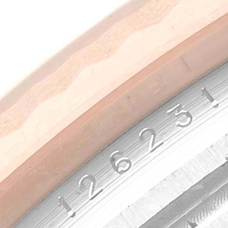 This close-up image shows a partial view of the case side and reference number of the Rolex Datejust 126231 Men's Steel and Gold (two tone) Brown Dial 126231 Men's Steel and Gold (two tone) Brown Dial watch.