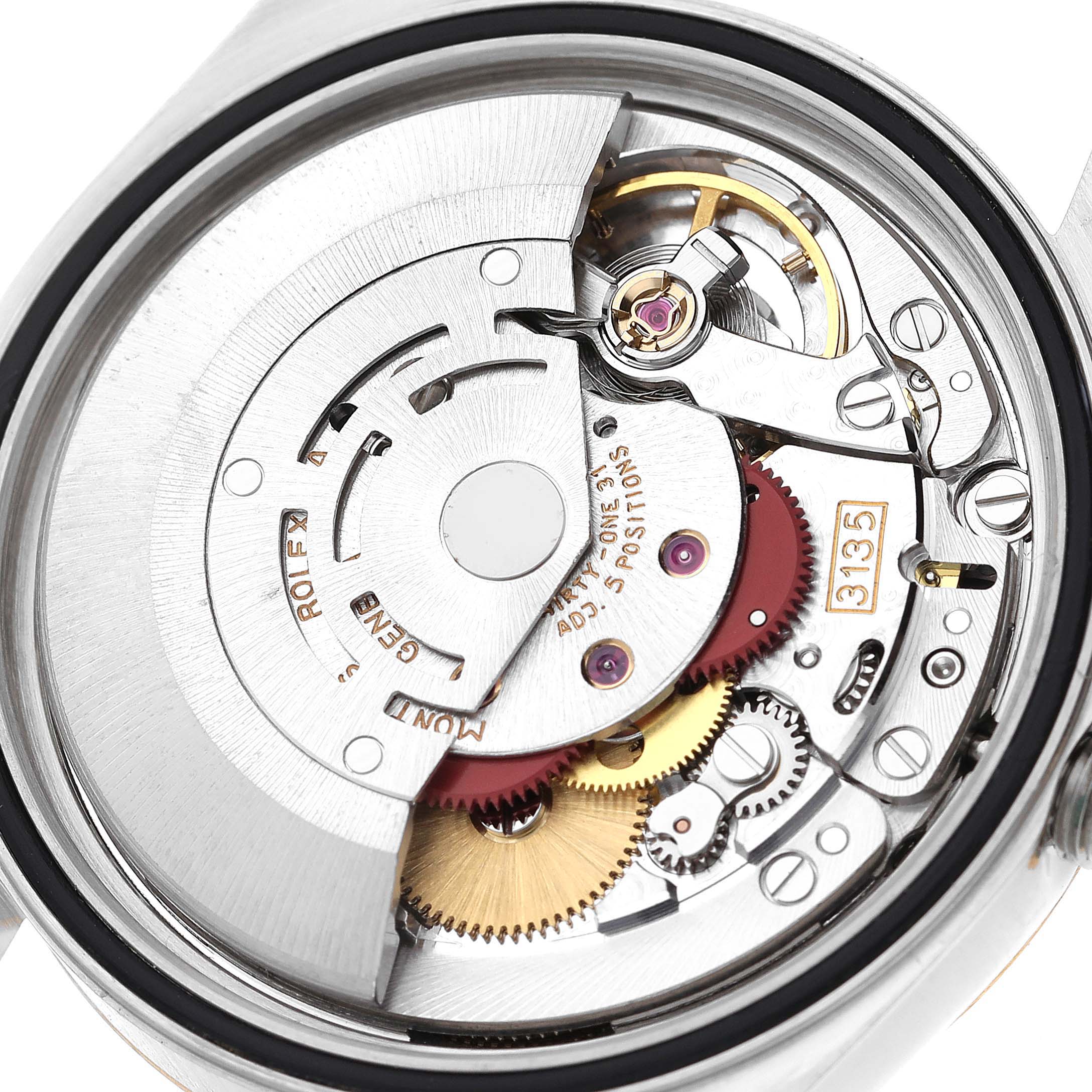 This image shows a close-up view of the movement inside a Rolex Datejust 16233 Men's Steel and Gold (two tone) Champagne Dial 16233 Men's Steel and Gold (two tone) Champagne Dial watch.
