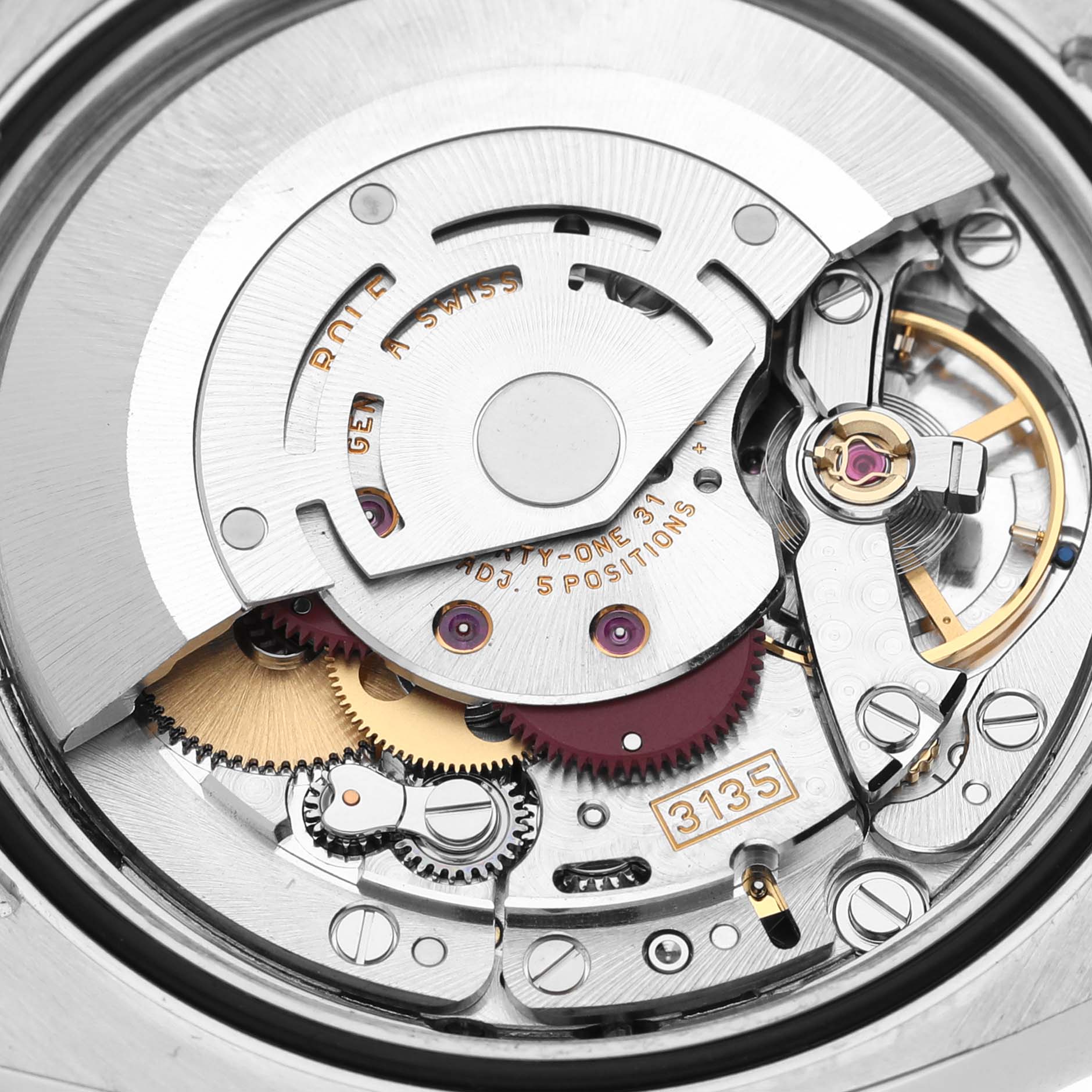 This image shows a close-up view of the automatic movement mechanism of the Rolex Datejust 116233 Men's Steel and Gold (two tone) Champagne Dial 116233 Men's Steel and Gold (two tone) Champagne Dial watch.