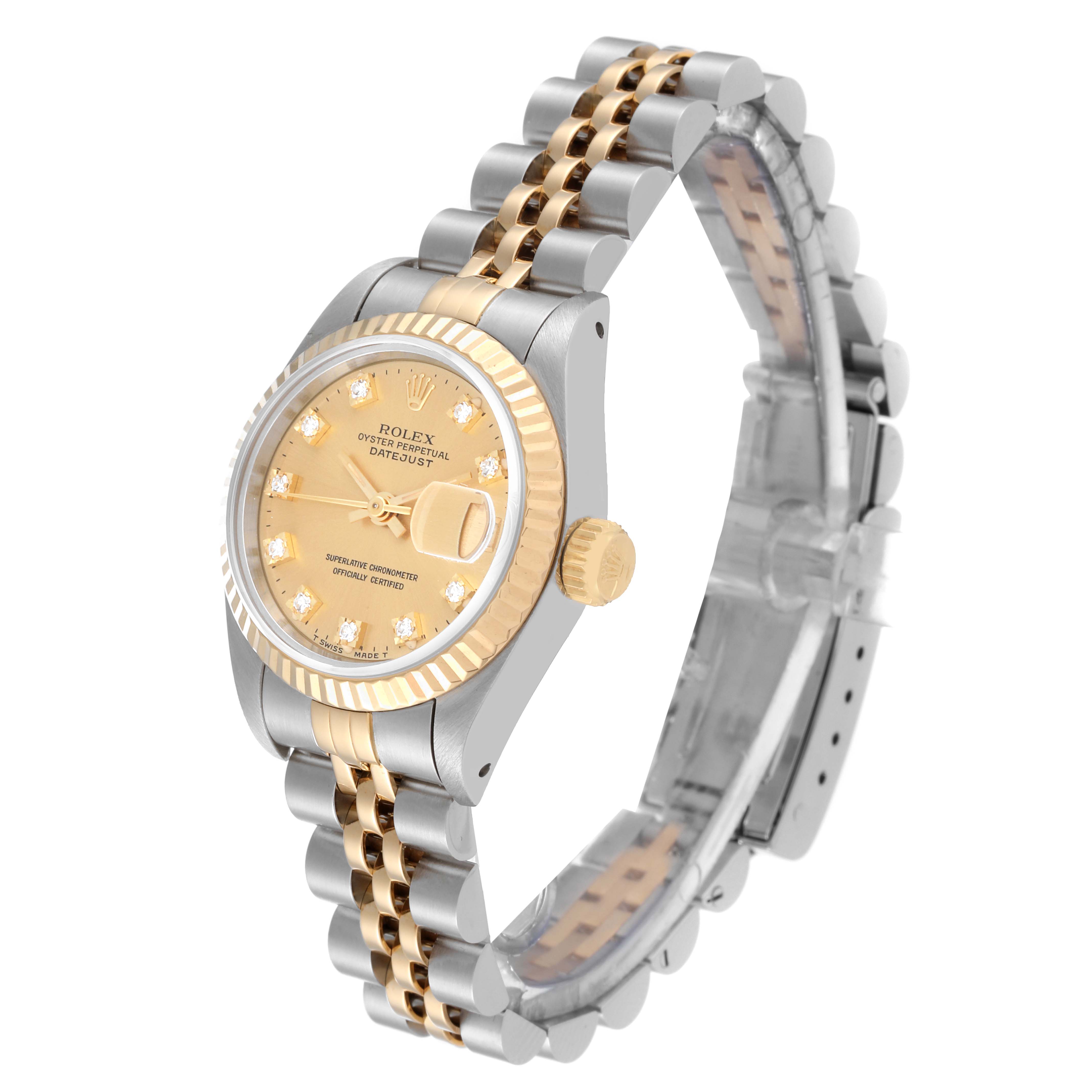 The image shows a Rolex Datejust 69173 Women's Steel and Gold (two tone) Champagne Dial 69173 Women's Steel and Gold (two tone) Champagne Dial watch from a three-quarter angle, highlighting its face, fluted bezel, and two-tone Jubilee bracelet.