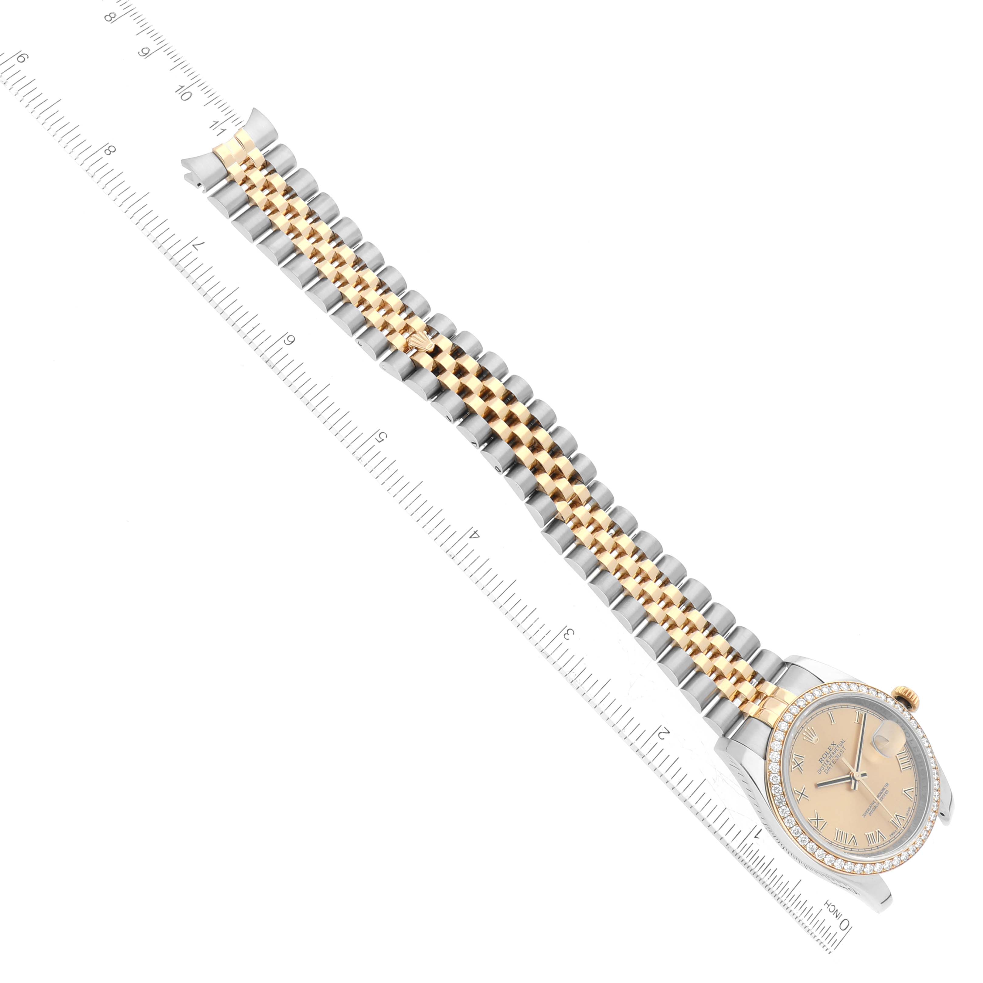 The image shows a Rolex Datejust 116243 Men's Steel and Gold (two tone) Champagne Dial 116243 Men's Steel and Gold (two tone) Champagne Dial watch positioned diagonally with the entire face and band visible, including a ruler for measuring.