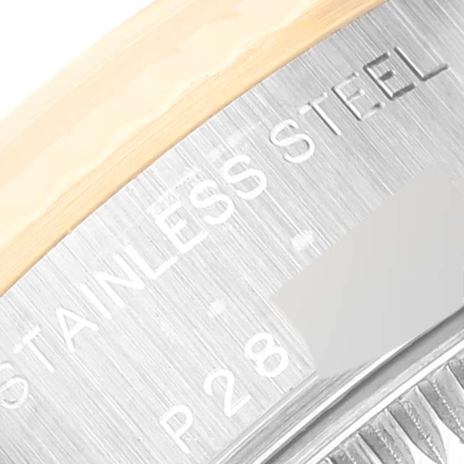 This close-up image shows the edge detail and part of the engraving on the bezel of a Rolex Datejust 79173NGR Women's Steel and Gold (two tone) Mother of Pearl Dial 79173NGR Women's Steel and Gold (two tone) Mother of Pearl Dial watch.