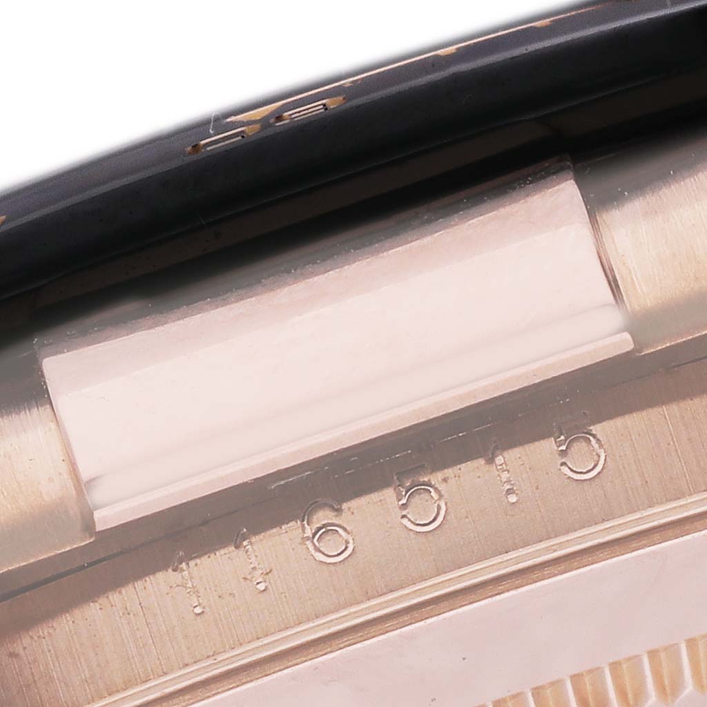 The image shows a close-up of the case edge and engraved serial number on a Rolex Daytona 116515LN Men's Rose Gold Brown Dial 116515LN Men's Rose Gold Brown Dial watch.