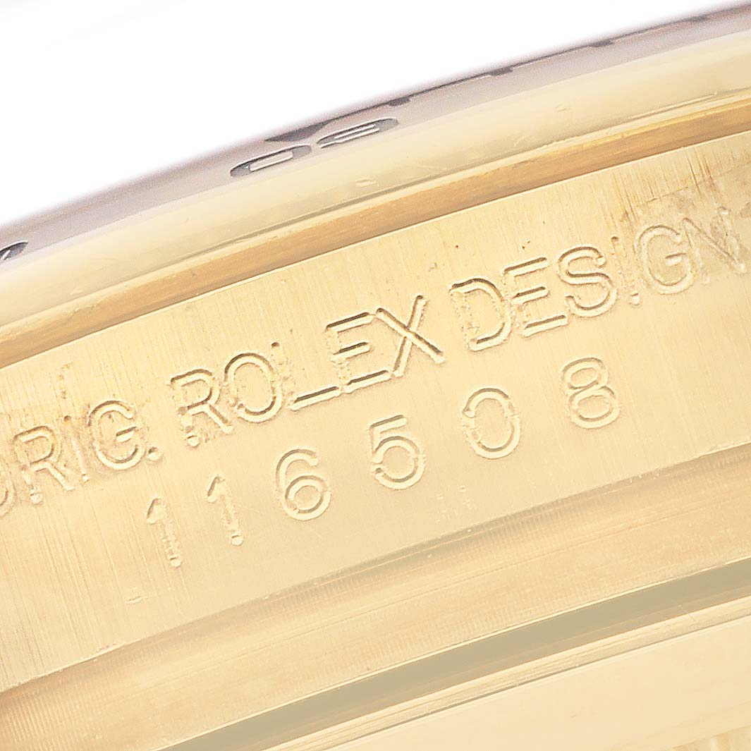 The image shows the inner bezel with engravings on the Rolex Daytona 116508 Men's Yellow Gold Green Dial 116508 Men's Yellow Gold Green Dial watch at a close-up angle.