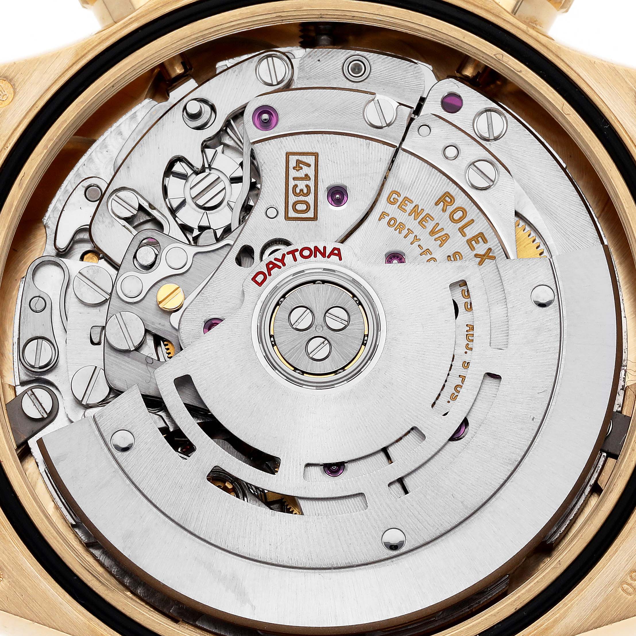 The image shows the movement mechanism of a Rolex Daytona 116508 Men's Yellow Gold Green Dial 116508 Men's Yellow Gold Green Dial watch, highlighting the rotor and intricate internal components.