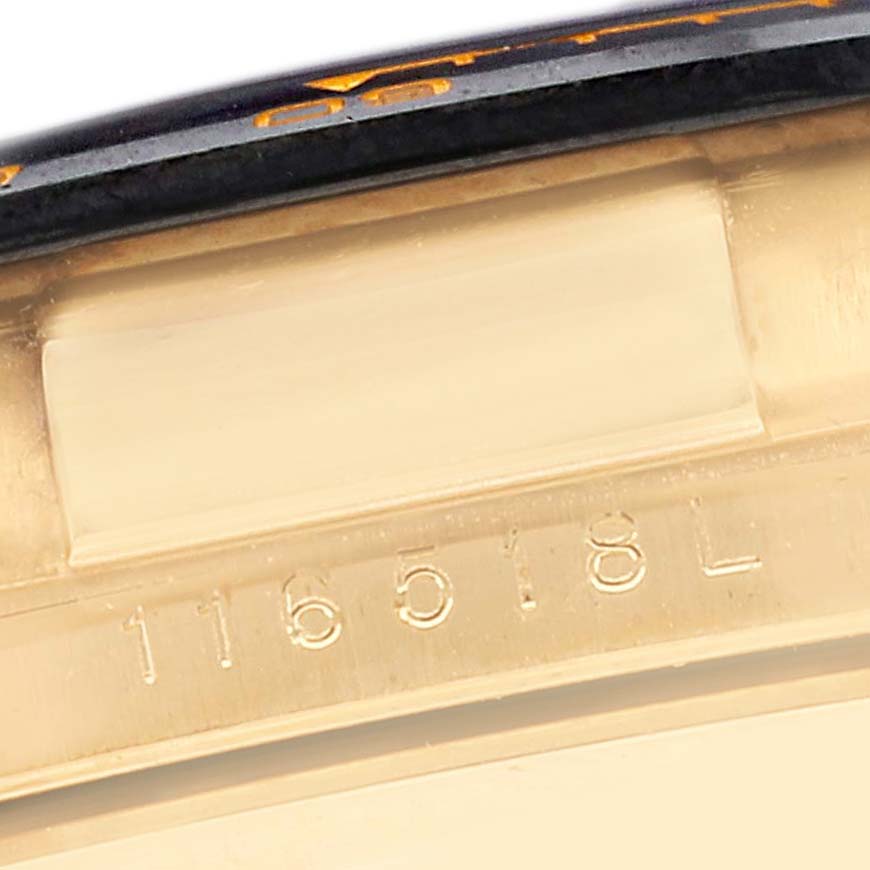 The image shows a close-up of the side of a Rolex Daytona 116518LN Men's Yellow Gold Mother of Pearl Dial 116518LN Men's Yellow Gold Mother of Pearl Dial watch case, highlighting the engraved model number.
