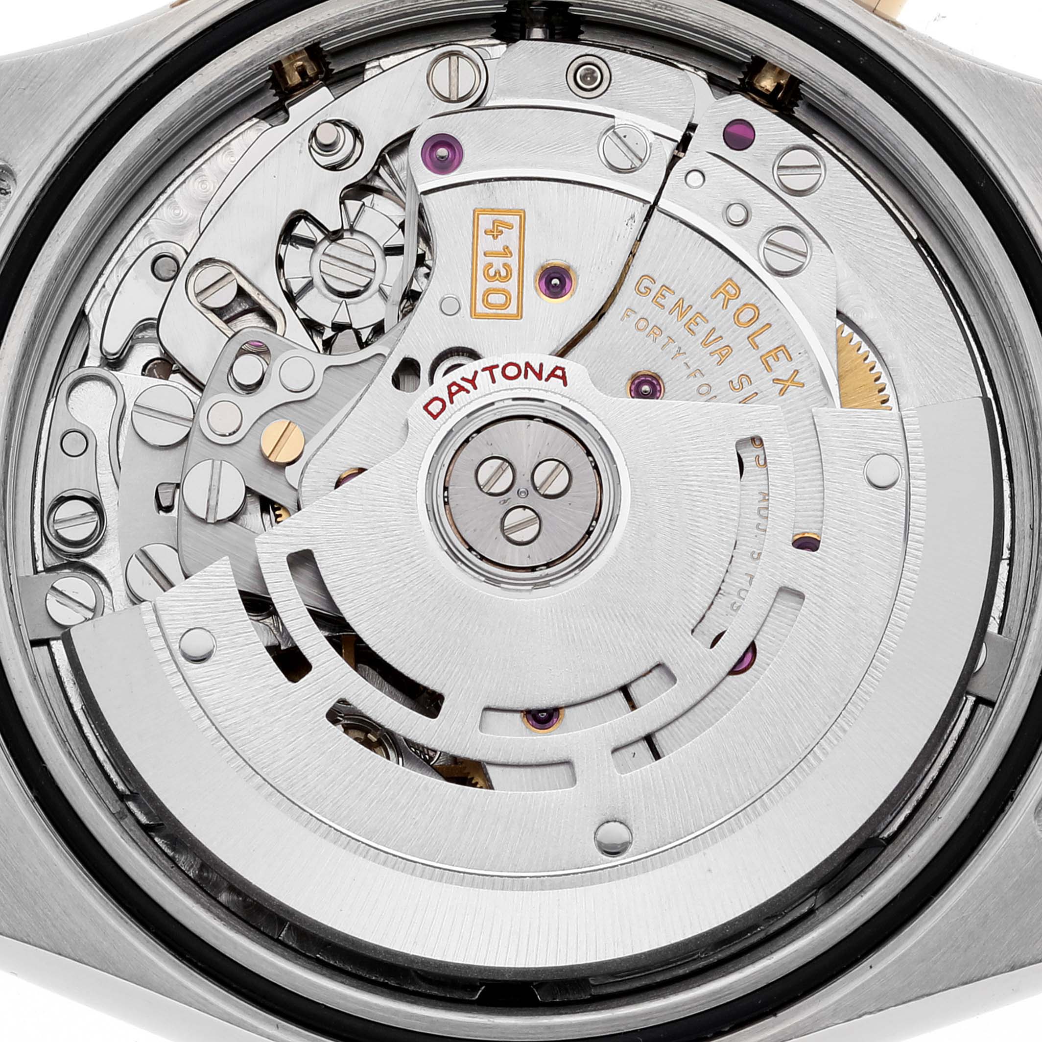 This image shows the intricate inner mechanism of the Rolex Daytona 116523 Men's Steel and Gold (two tone) Mother of Pearl Dial 116523 Men's Steel and Gold (two tone) Mother of Pearl Dial watch from a back view angle.