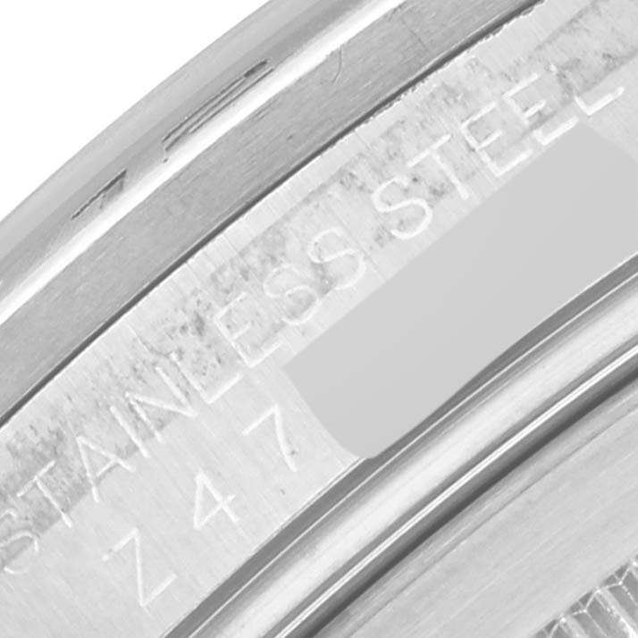 The image shows a close-up of the engraved bezel of a Rolex Explorer 16570 Men
s Stainless Steel Black Dial 16570 Men
s Stainless Steel Black Dial model, highlighting "STAINLESS STEEL Z 47".