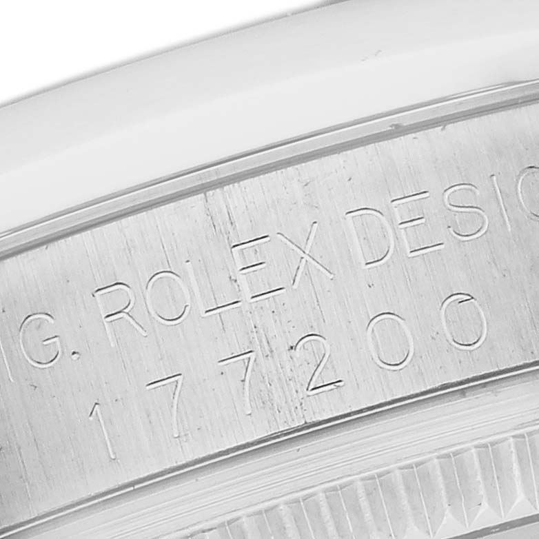 The image shows the side engraving on a Rolex Mid-Size 177200 Women's Stainless Steel Silver Dial 177200 Women's Stainless Steel Silver Dial model, highlighting the serial and design numbers.
