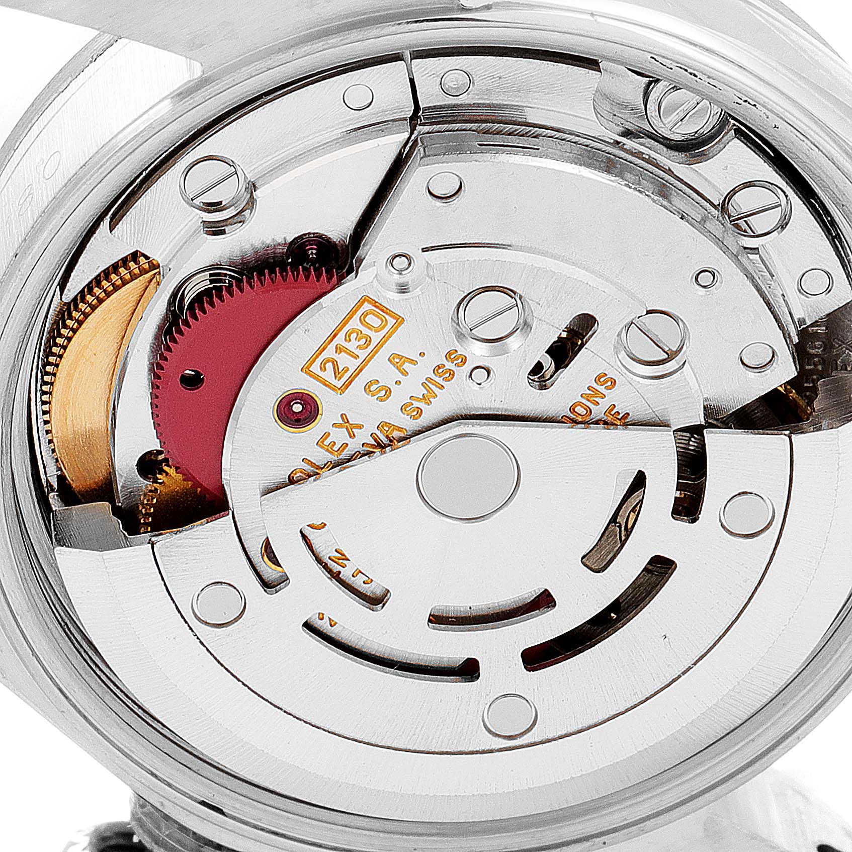 This image shows the internal mechanism of the Rolex Oyster Perpetual 67180 Women's Stainless Steel Black Dial 67180 Women's Stainless Steel Black Dial watch at a close-up angle, highlighting the movement parts.