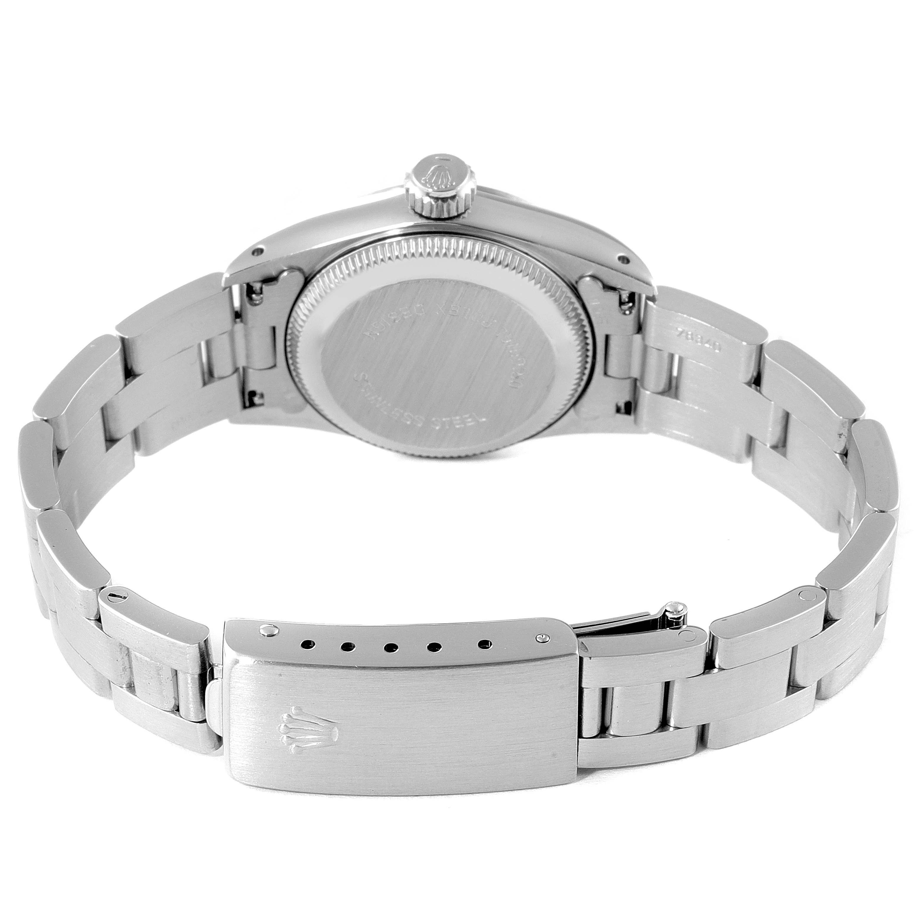 This rear view of the Rolex Oyster Perpetual 67180 Women's Stainless Steel Black Dial 67180 Women's Stainless Steel Black Dial highlights the closed clasp, bracelet, and case back.