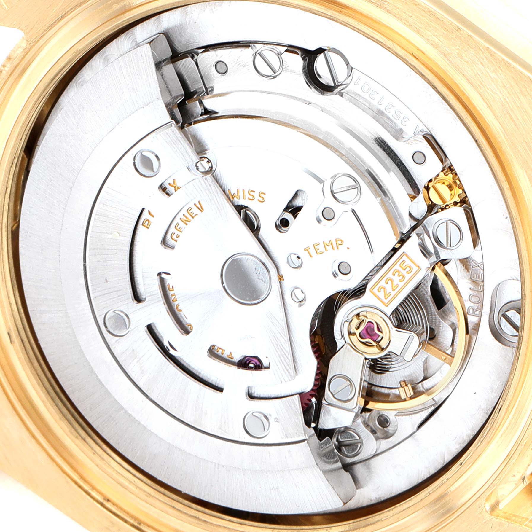 This image shows a close-up of the inner movement mechanism of a Rolex President 178288 Women
s Yellow Gold Mother of Pearl Dial 178288 Women
s Yellow Gold Mother of Pearl Dial model watch.