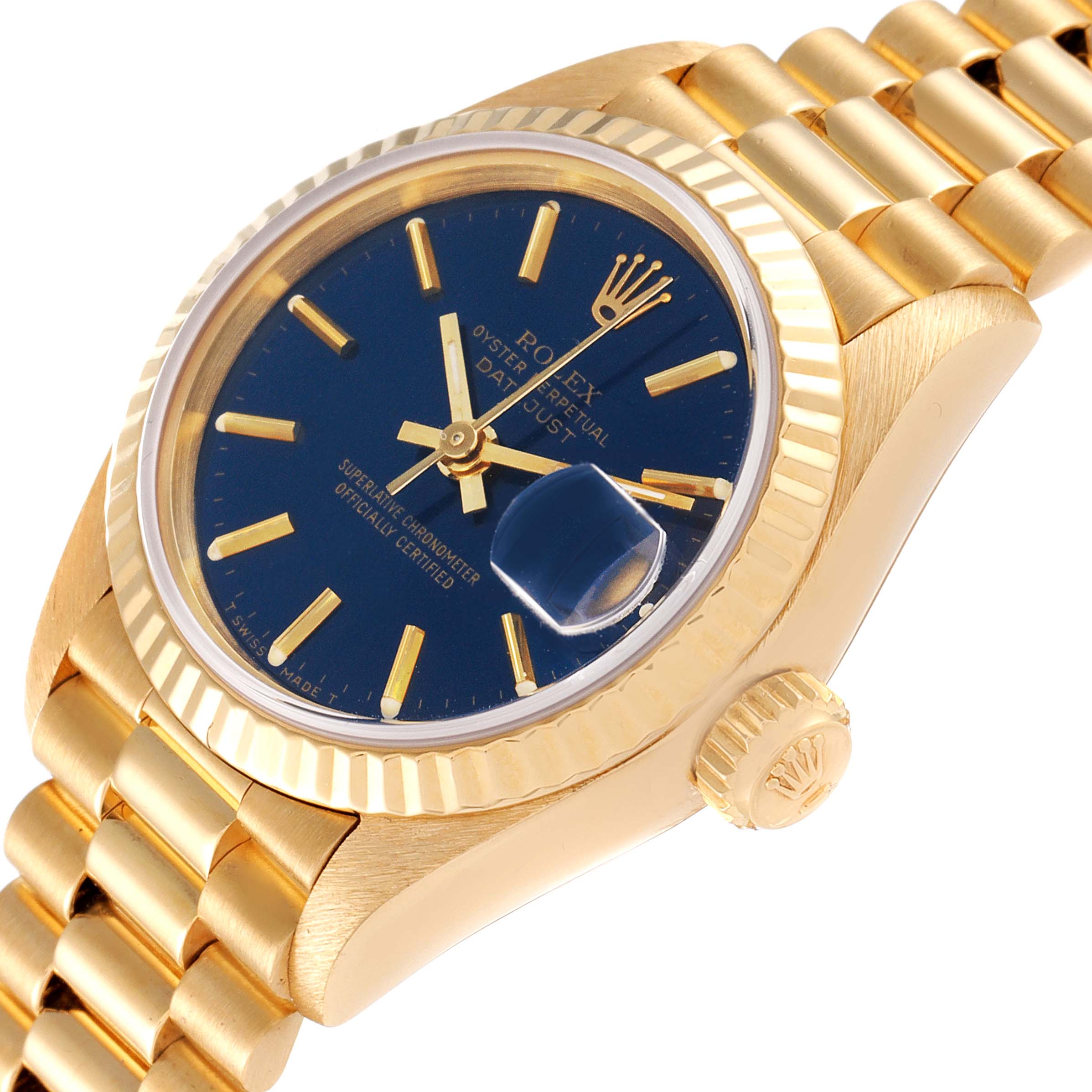 This image shows a close-up of the Rolex President 69178 Women's Yellow Gold Blue Dial 69178 Women's Yellow Gold Blue Dial model watch, focusing on its dial, bezel, crown, and part of the bracelet.