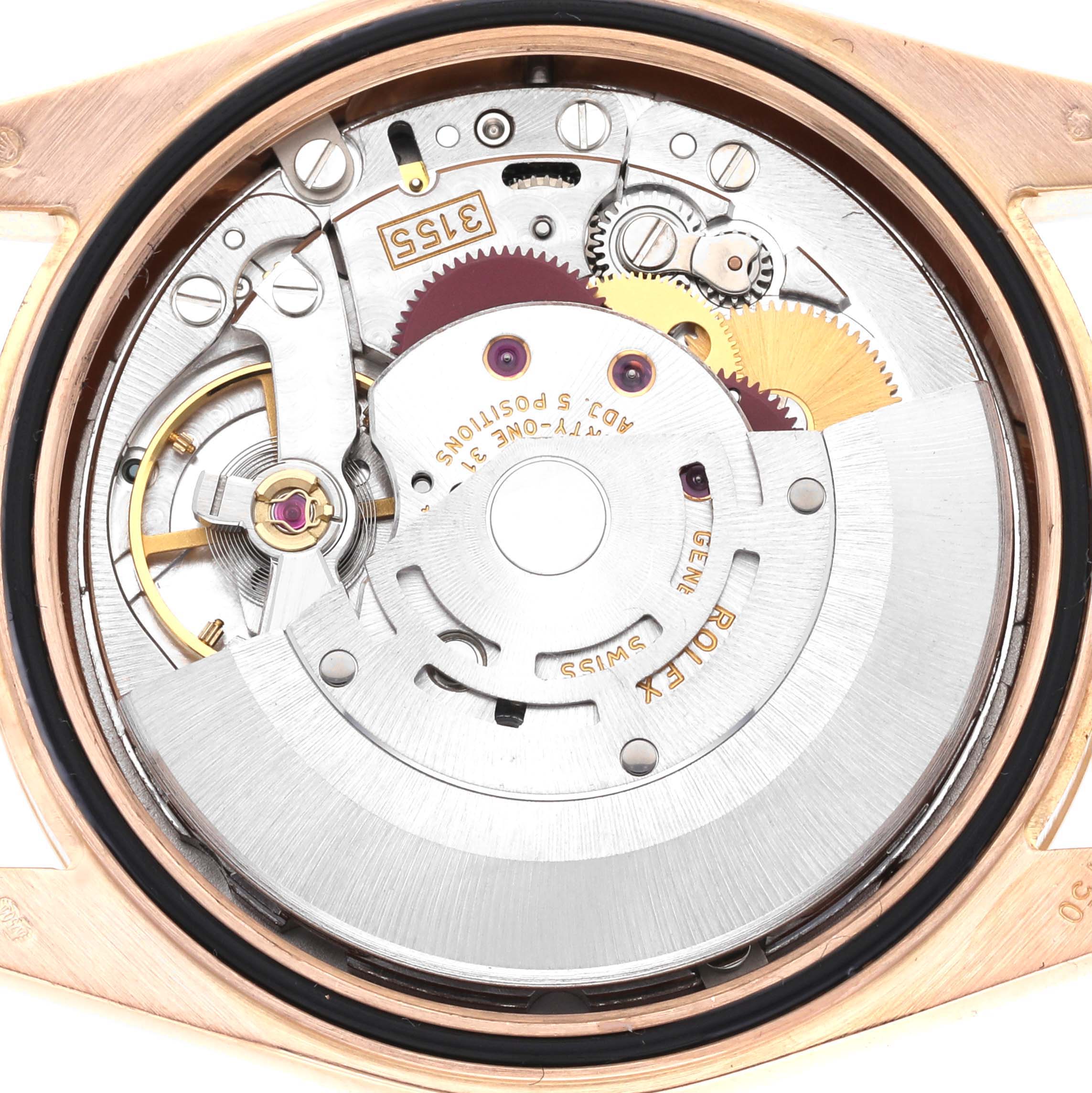 The image shows the internal movement of a Rolex President 118235 Men
s Rose Gold Pink Dial 118235 Men
s Rose Gold Pink Dial watch from a top-down angle.