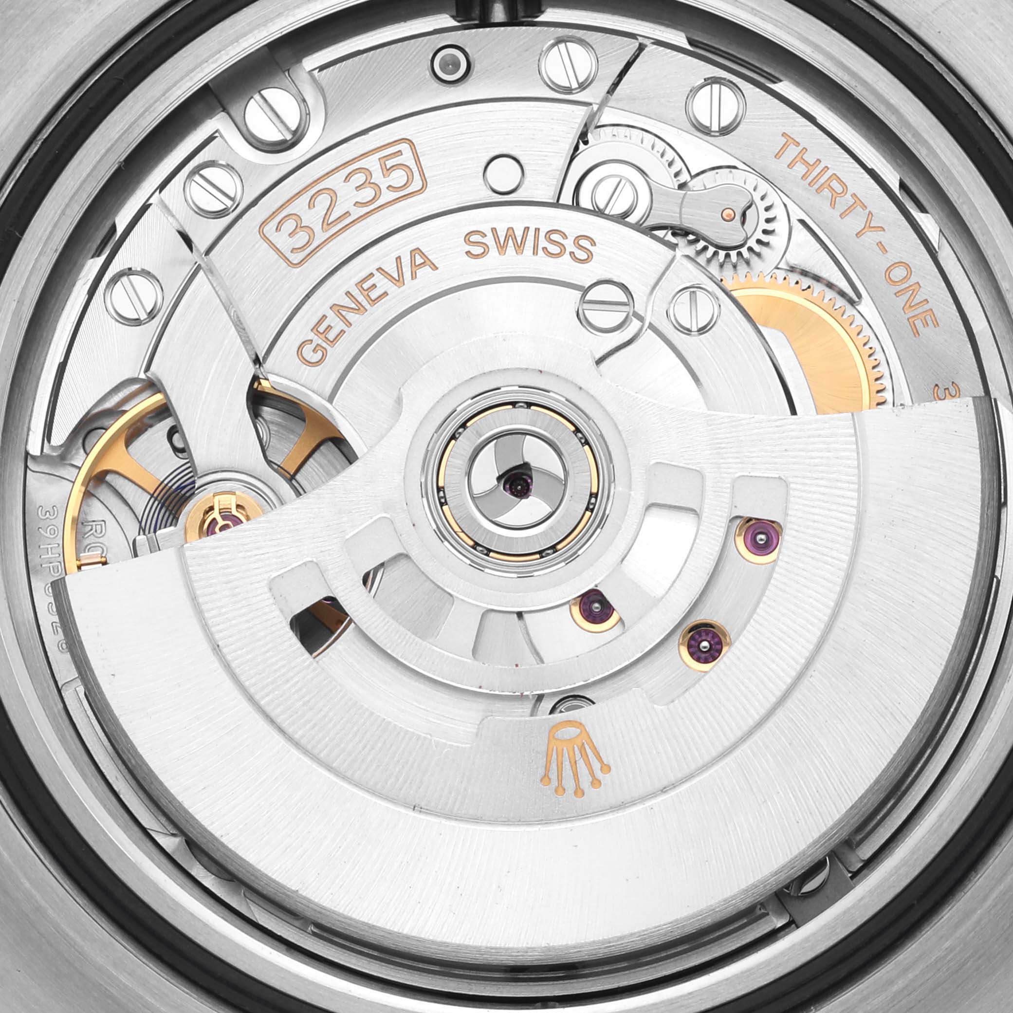 The image shows a close-up of the Rolex Sea-Dweller 126600 Men's Stainless Steel Black Dial 126600 Men's Stainless Steel Black Dial's movement, highlighting its inner mechanics and rotor.