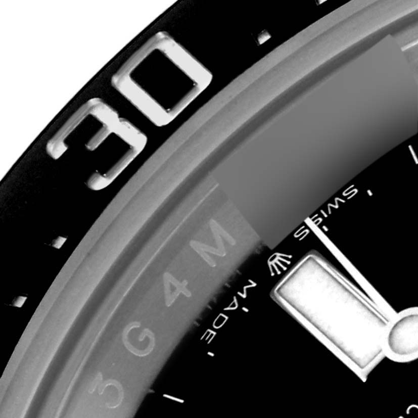 The image shows a close-up of the bezel and dial of the Rolex Sea-Dweller 126600 Men's Stainless Steel Black Dial 126600 Men's Stainless Steel Black Dial, highlighting the "30" minute mark and part of the hand.
