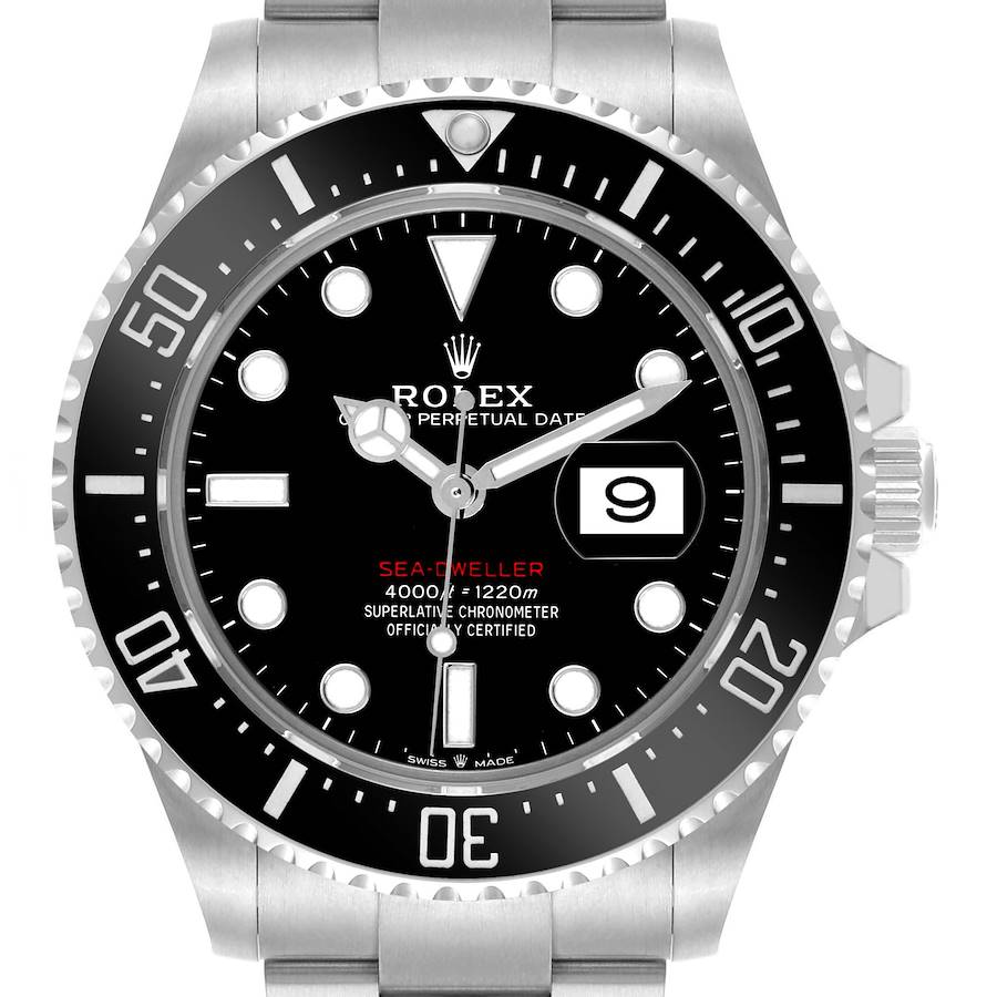 The Rolex Sea-Dweller watch is shown from a front angle, displaying the dial, bezel, and part of the bracelet.