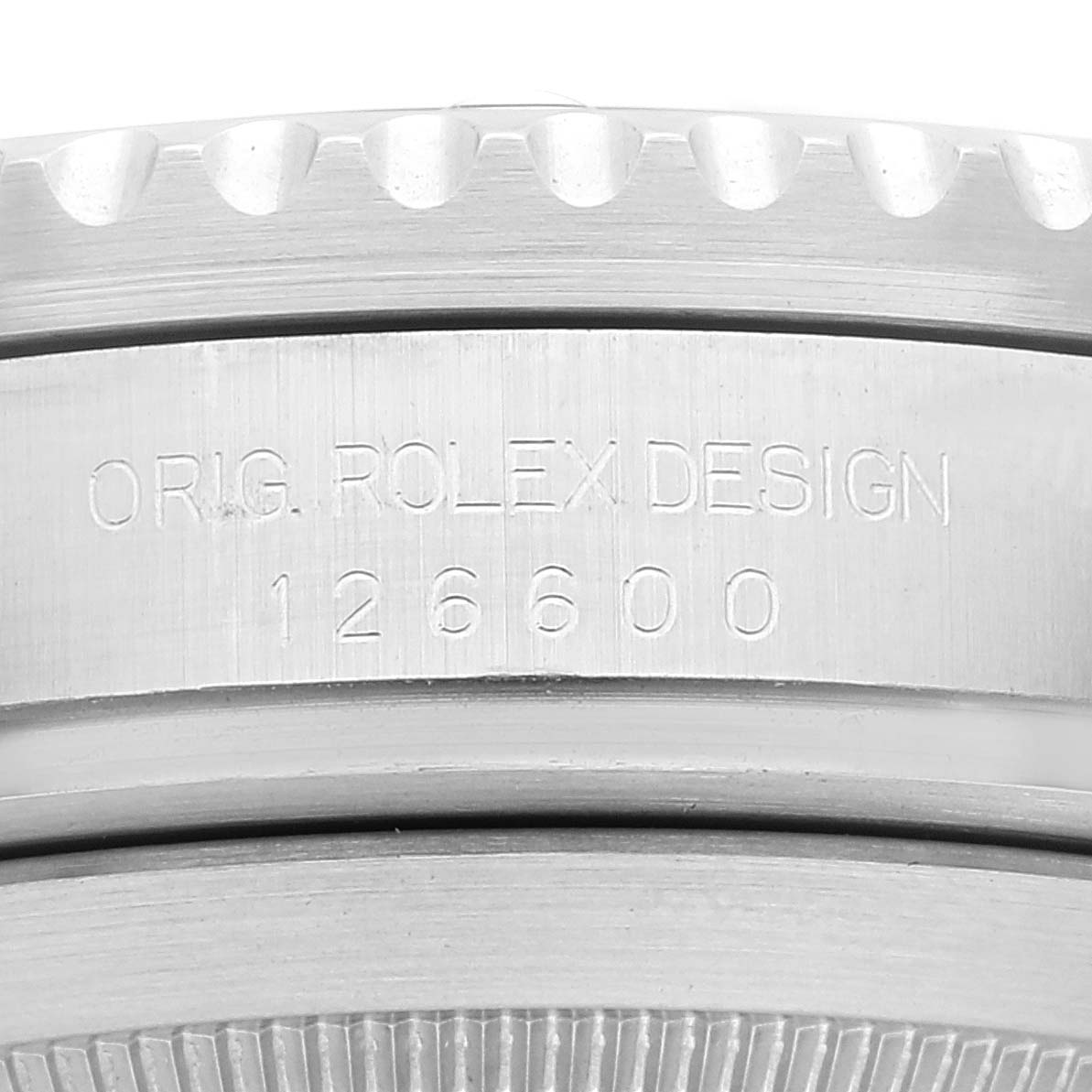 The image shows a close-up of the model number 126600 engraved on the case of a Rolex Sea-Dweller 126600 Men
s Stainless Steel Black Dial 126600 Men
s Stainless Steel Black Dial watch.