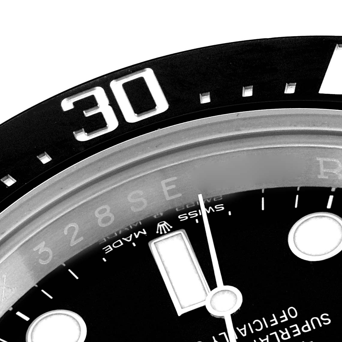 This image shows a close-up of the dial and bezel of a Rolex Sea-Dweller 126600 Men
s Stainless Steel Black Dial 126600 Men
s Stainless Steel Black Dial watch, specifically focusing on the "30" minute marker.