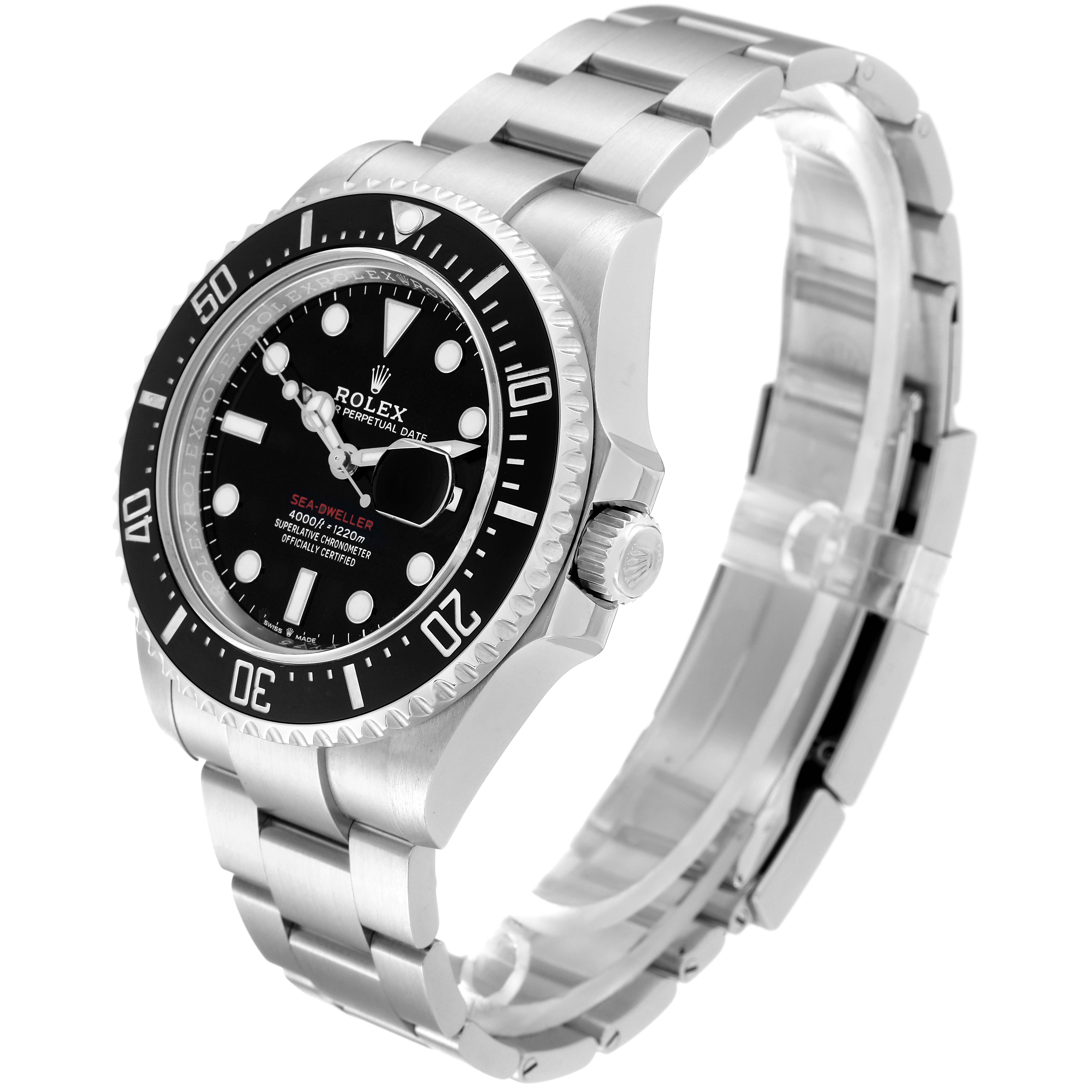 The image shows a side angle of the Rolex Sea-Dweller 126600 Men
s Stainless Steel Black Dial 126600 Men
s Stainless Steel Black Dial watch, displaying its face, bezel, crown, and bracelet.
