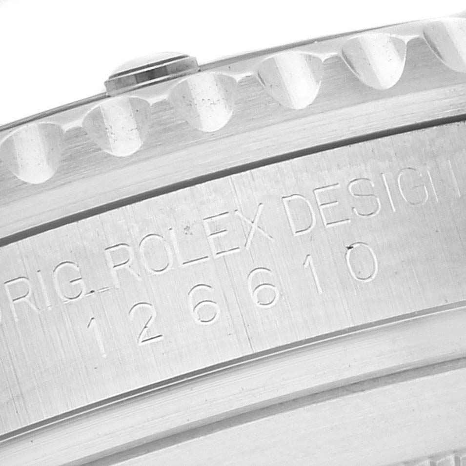 This image shows a close-up of the Rolex Submariner 126610LN Men
s Stainless Steel Black Dial 126610LN Men
s Stainless Steel Black Dial
s case side, highlighting the etched serial number "126610".