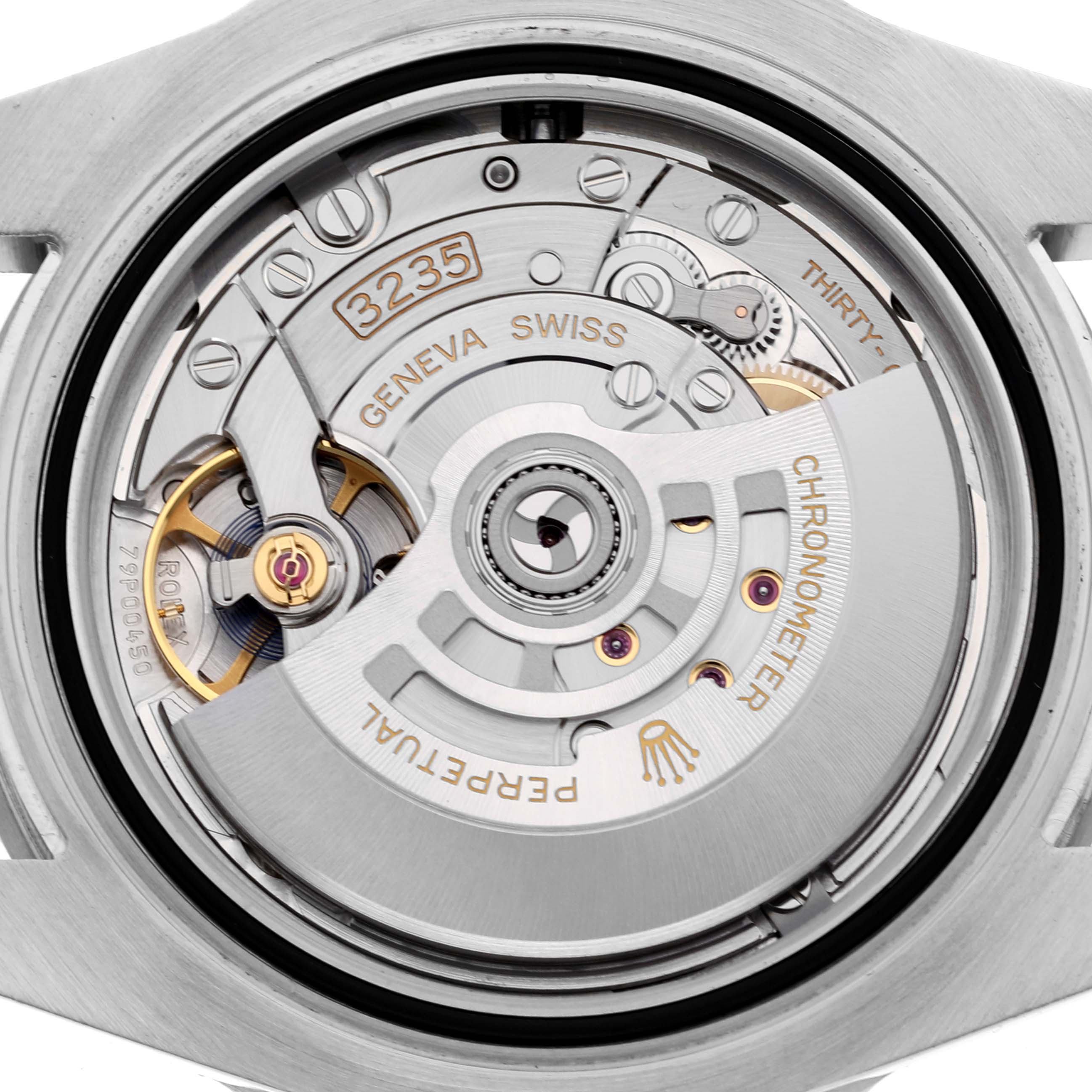 The image shows the Rolex Submariner 126610LN Men
s Stainless Steel Black Dial 126610LN Men
s Stainless Steel Black Dial
s movement mechanism, viewed from the case back.