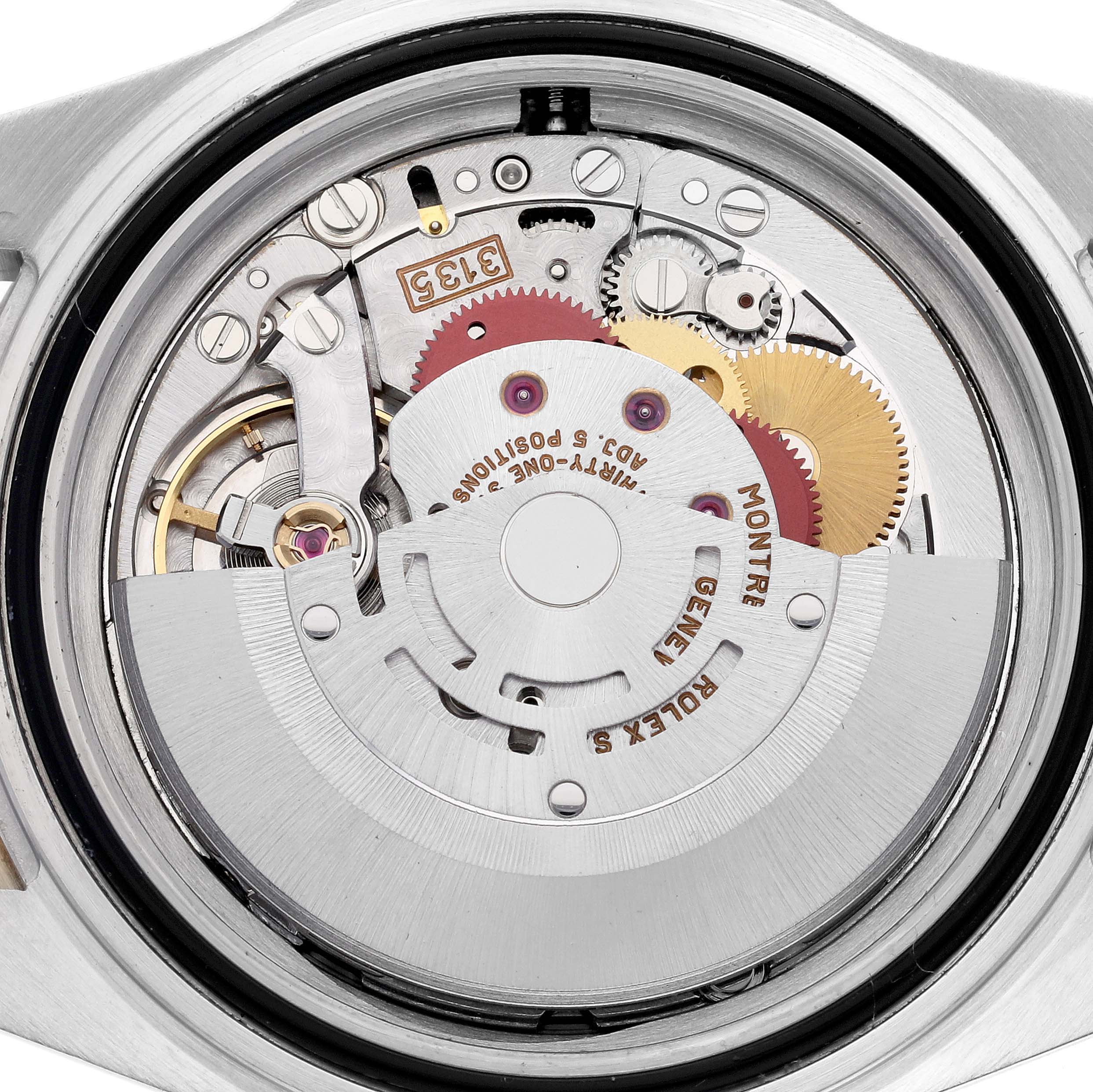 The image shows the internal mechanical components of the Rolex Submariner 16613 Men's Steel and Gold (two tone) Champagne Dial 16613 Men's Steel and Gold (two tone) Champagne Dial watch at a straight-on angle.