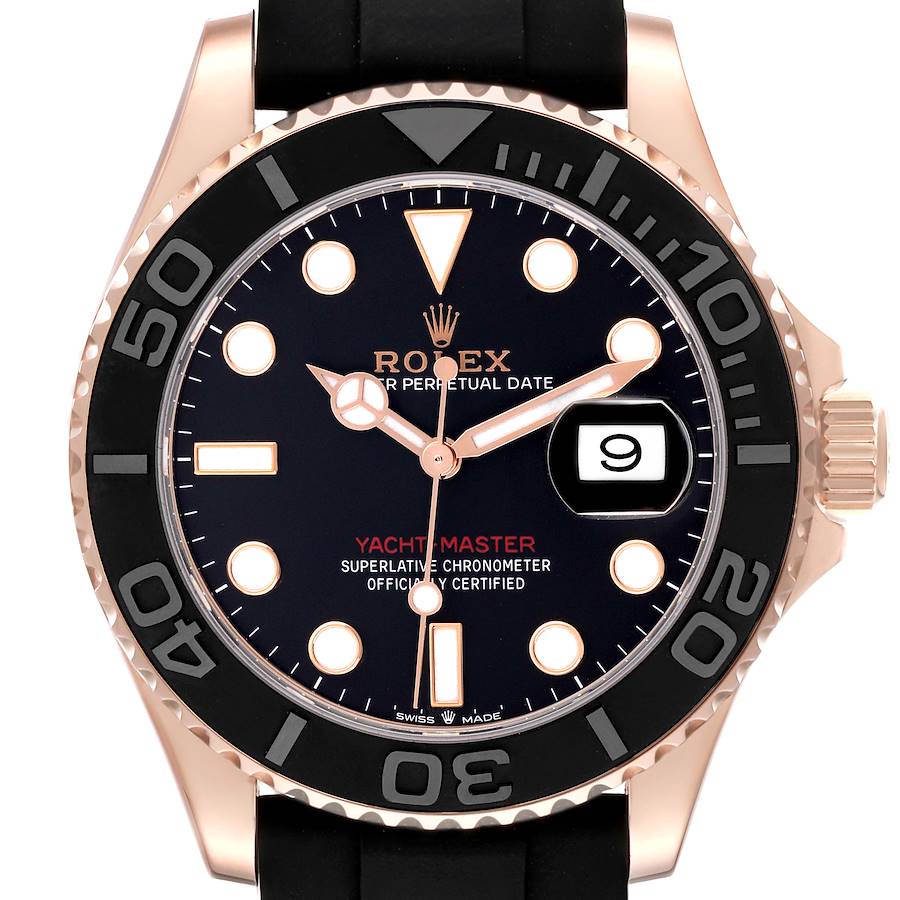 The Rolex Yacht-Master watch is shown from the front, highlighting the dial, bezel, and date window.