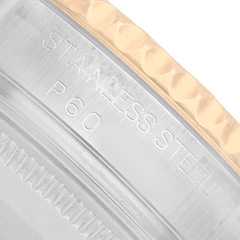 The image shows a close-up of the Rolex Yacht-Master 168623 Men's Steel and Gold (two tone) White Dial's bezel and edge, highlighting the stainless steel and gold finish.