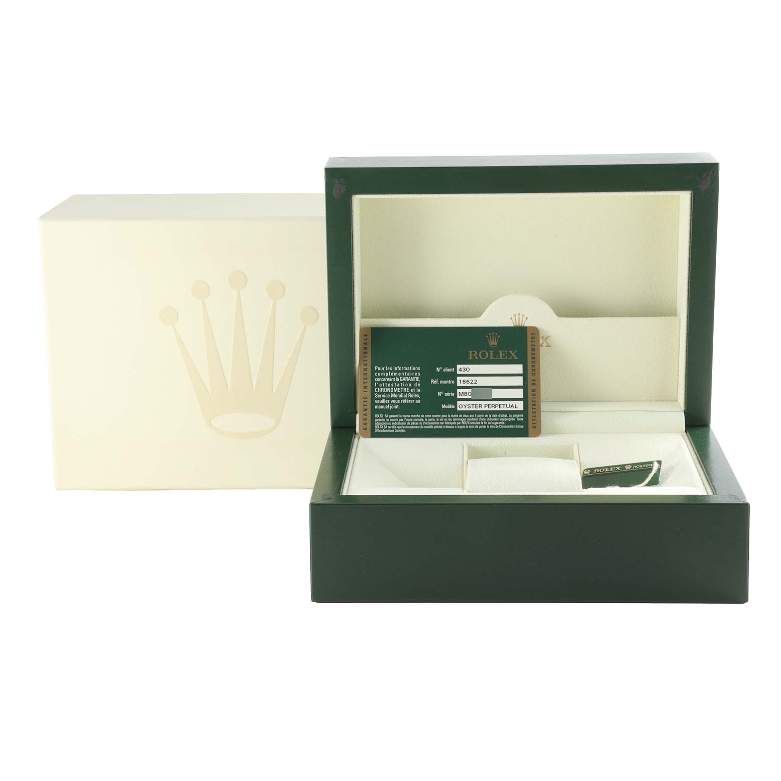 The image shows the open box of a Rolex Yacht-Master 16622 Men's Stainless Steel Silver Dial 16622 Men's Stainless Steel Silver Dial watch, displaying accompanying certification and packaging materials.